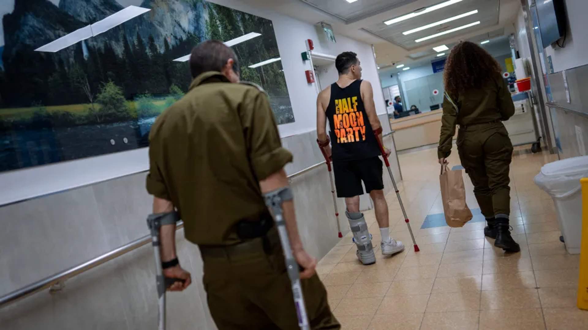 Israeli soldiers wounded in the war with Hamas walk in the rehabilitation division of Sheba Hospital in Ramat Gan, Israel, Monday, Dec. 18, 2023 - [Oded Balilty - AP Photo]