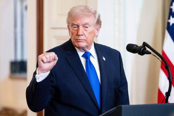 Donald Trump raises a fist after speaking about targeting media outlets who are critical of him - Feb 23, 2026