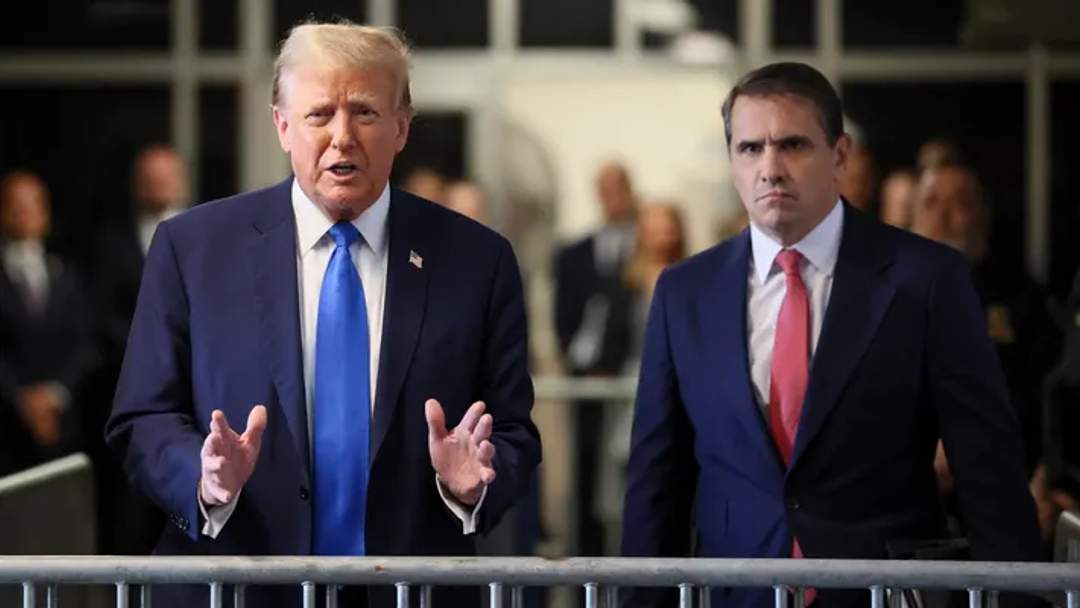 Todd Blanche and Donald Trump together.