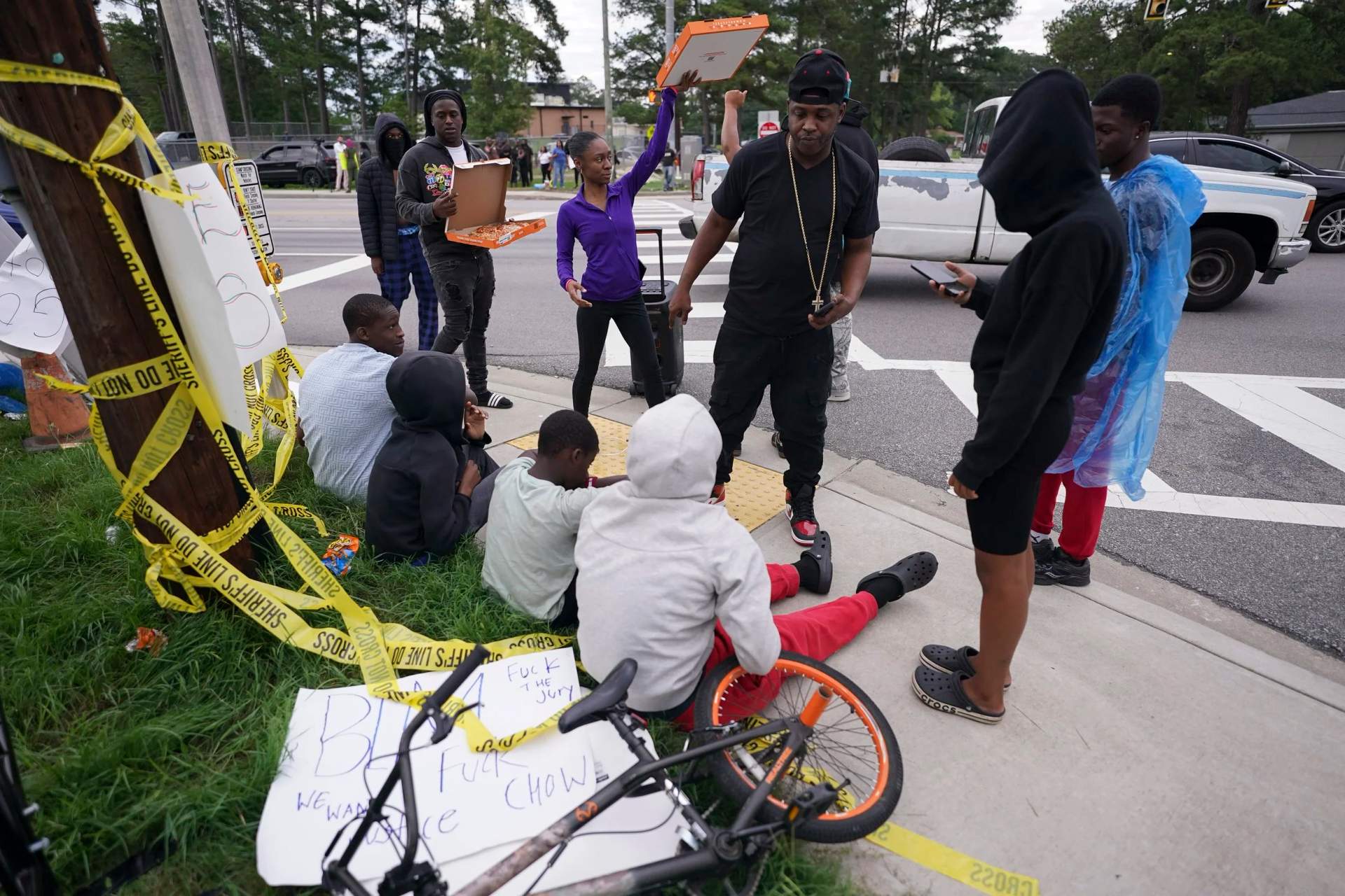 Protesters gathered at the South Carolina State House holding signs demanding justice for Cyrus Carmack-Belton