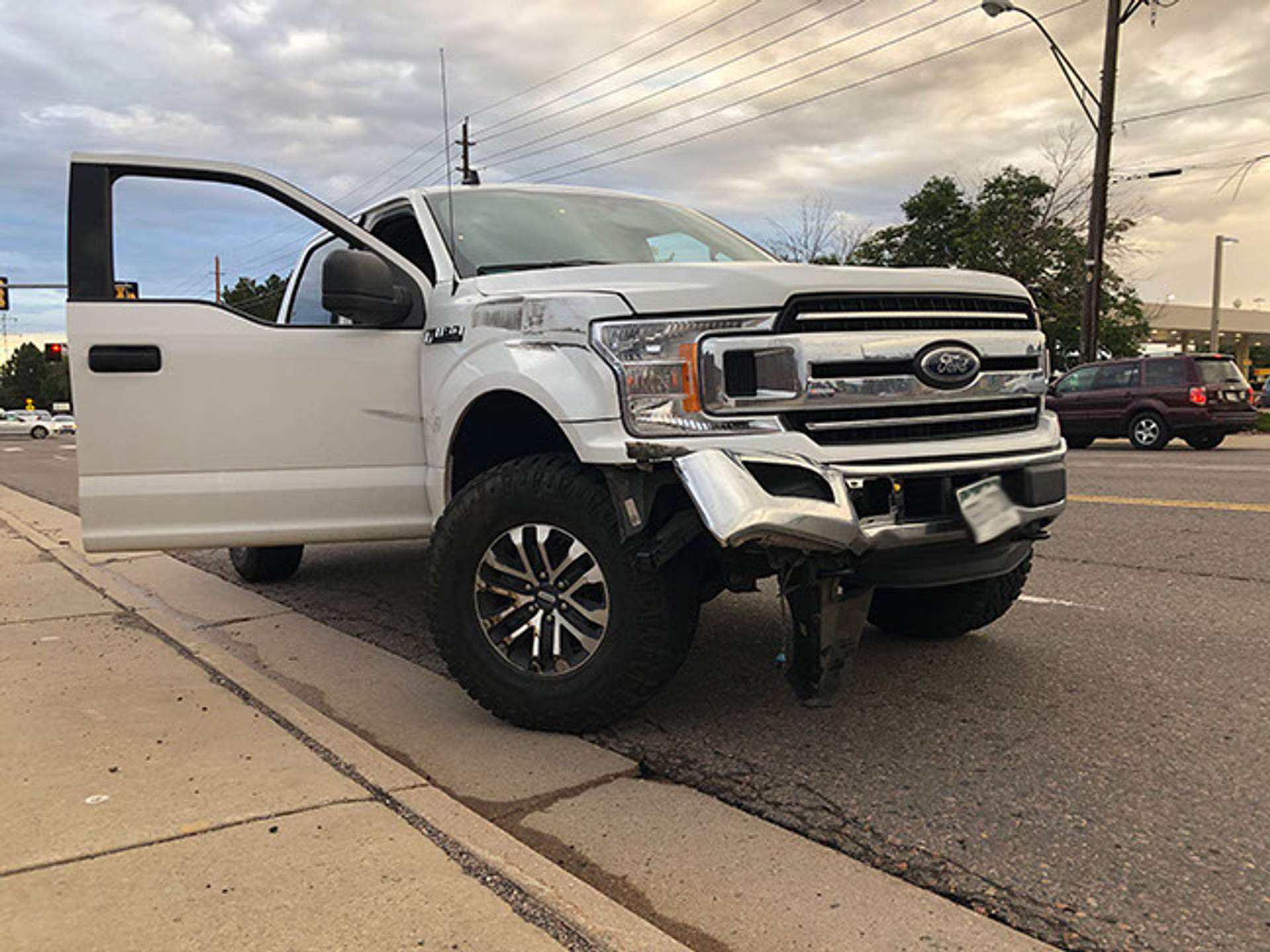 White truck that struck the jeep in attempts to stop it speeding toward protesters. [Radical Edward - Untelevised Media]