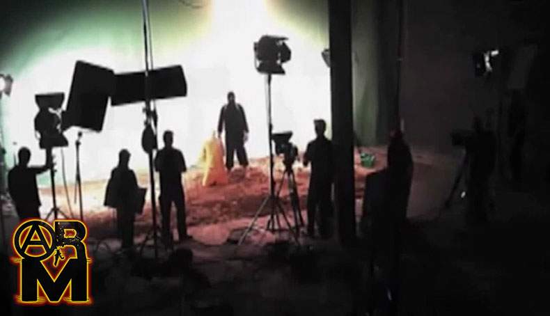 Leaked video from John McCain's staffers phone, showing a fake ISIS beheading video