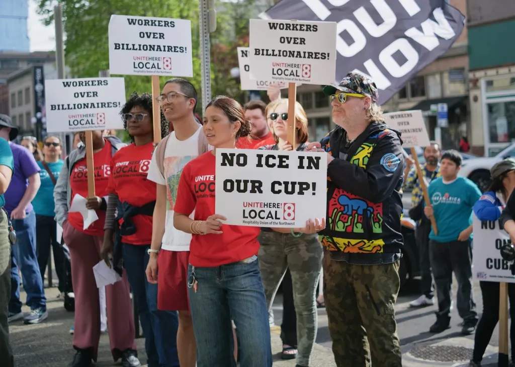 Unite Here Local 8 members picket the Hilton Suites ahead of the 2026 World Cup in Seattle.