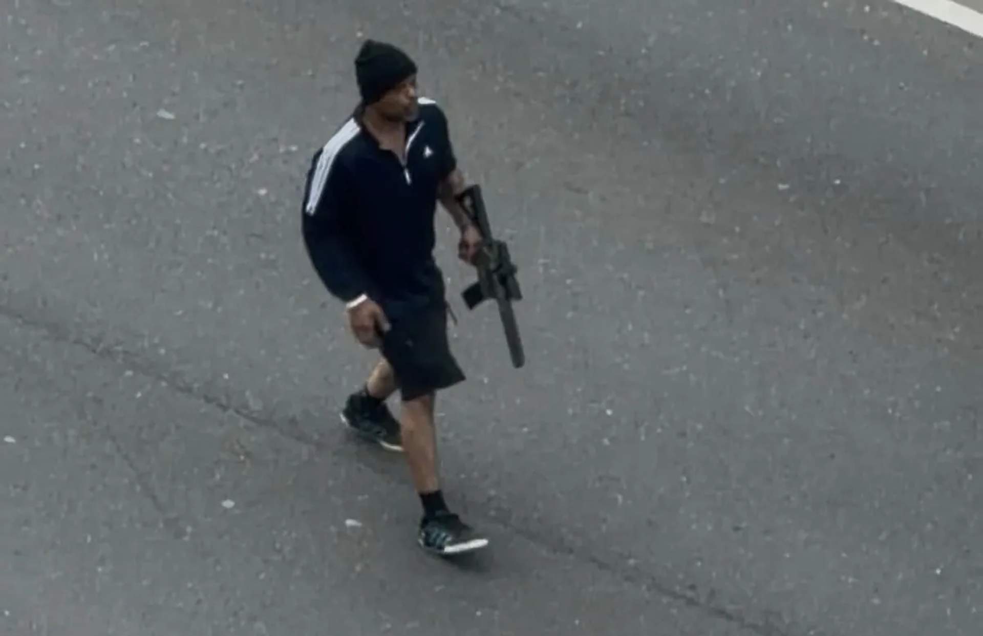 Tyler E. Brown shooting into traffic in Cambridge.