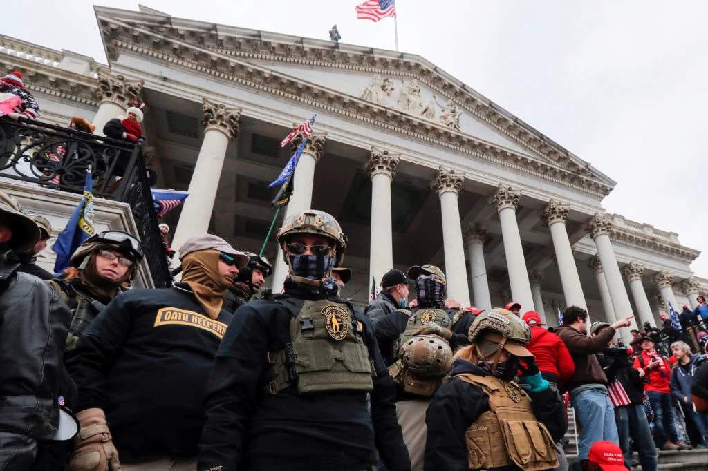 Oath Keepers members in tactical gear on the steps of the U.S. Capitol on January 6, 2021