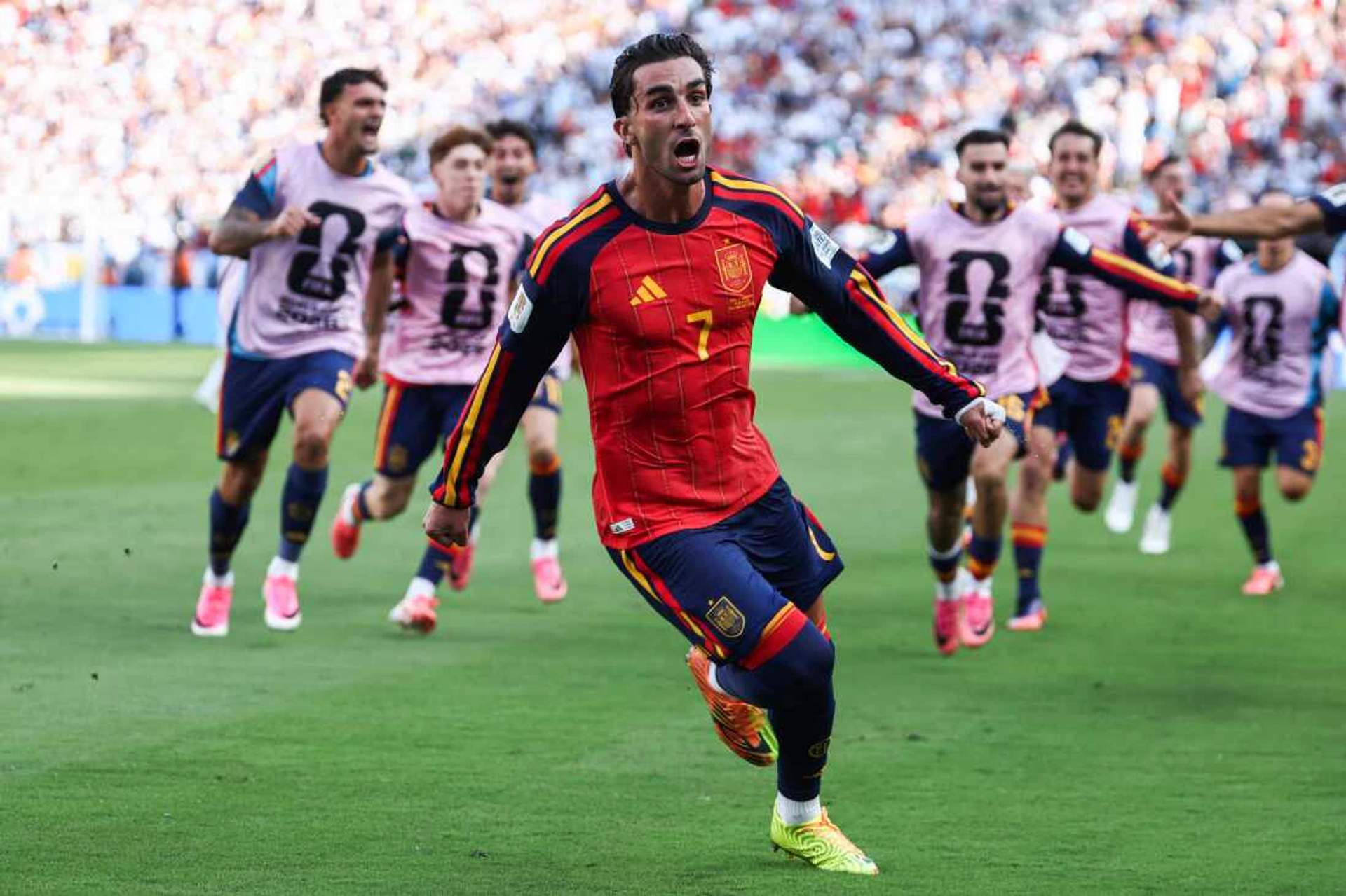 Spain forward Ferran Torres celebrates with teammates after scoring the winning goal against Argentina in the 2026 FIFA World Cup Final