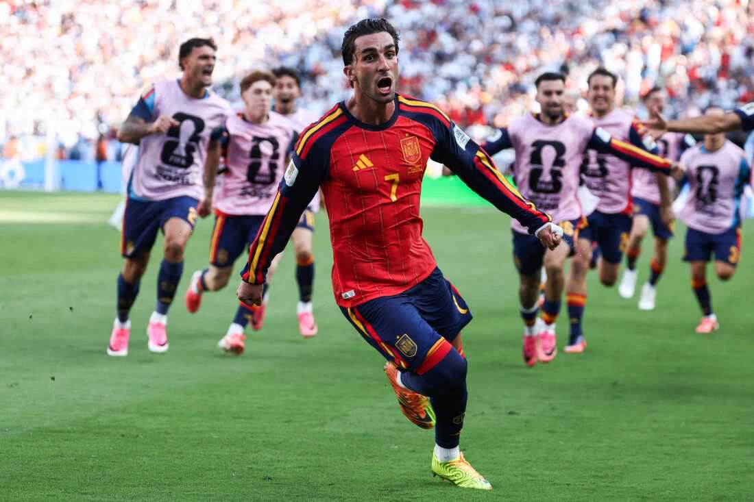 Spain forward Ferran Torres celebrates with teammates after scoring the winning goal against Argentina in the 2026 FIFA World Cup Final