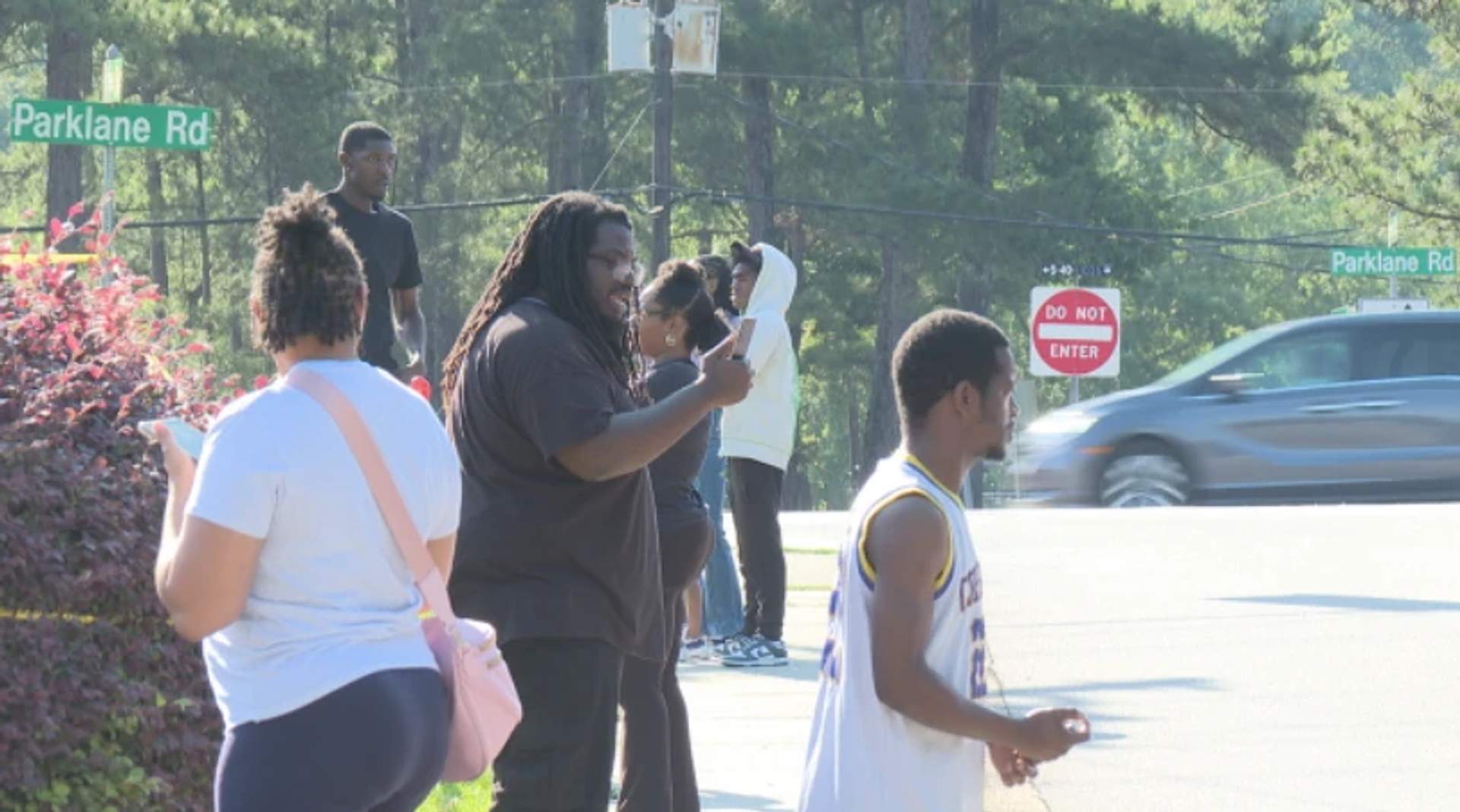 A crowd of demonstrators holding signs and gathering at a protest rally in Columbia, South Carolina after Rick Chow was acquitted in the shooting death of Cyrus Carmack-Belton