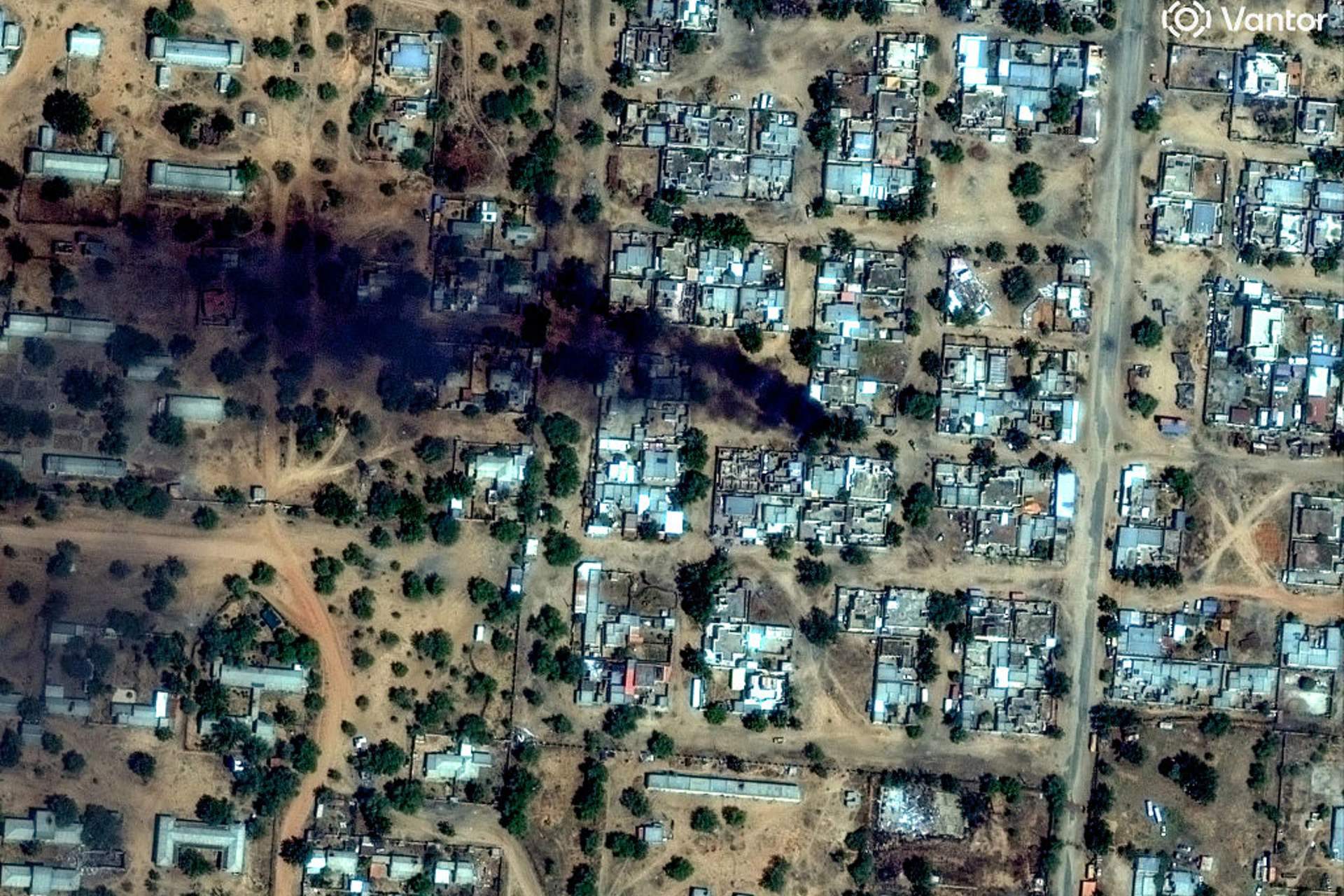 Satellite image shows fires and smoke near El Fasher airport as RSF forces captured the city in October 2025