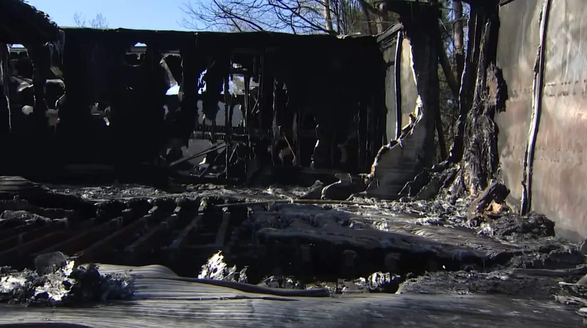 Inside totally destroyed tractor trailers.