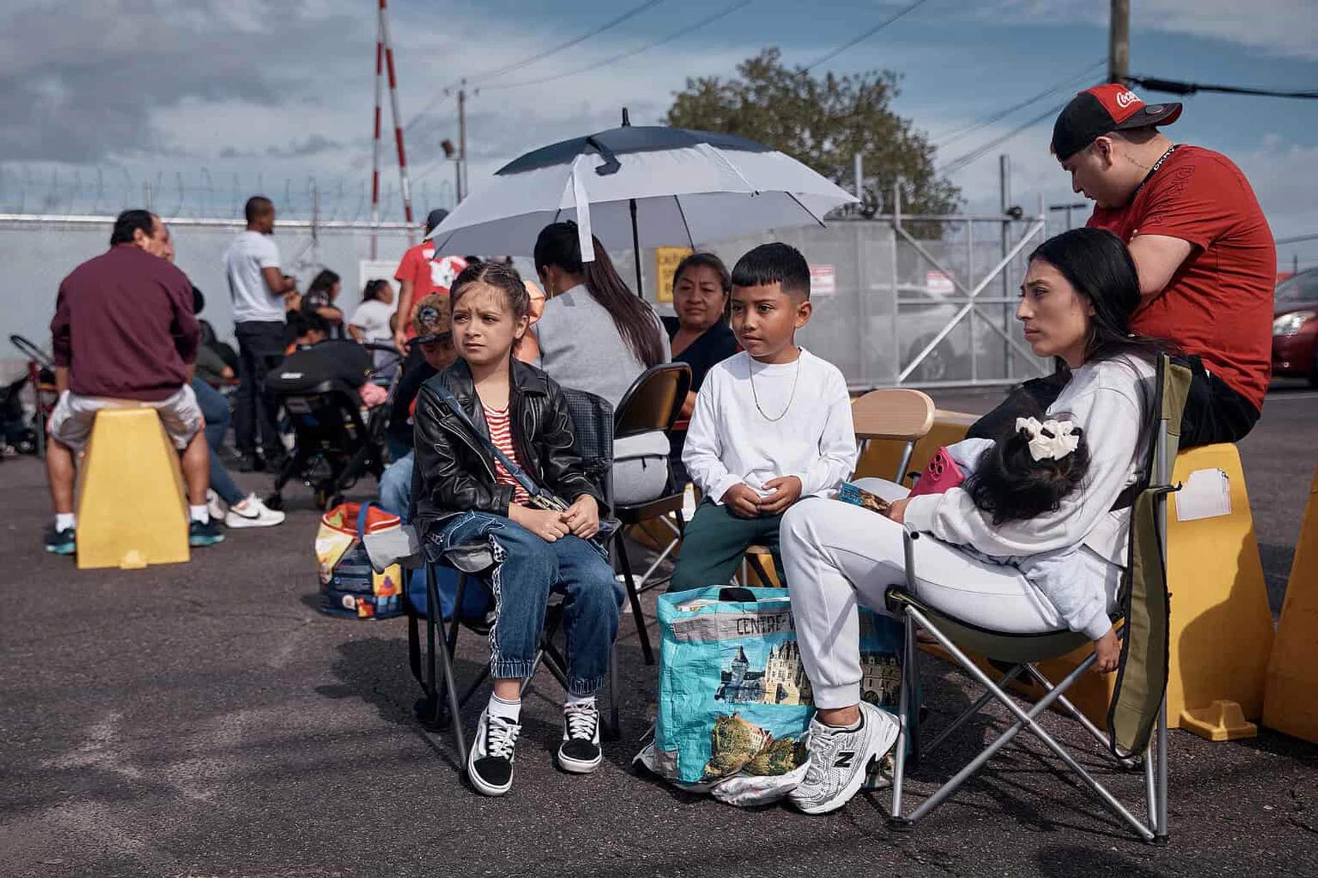 People line up outside the Delaney Hall Detention Center to visit their relatives and friends on Monday, Sept. 1, in Newark. 