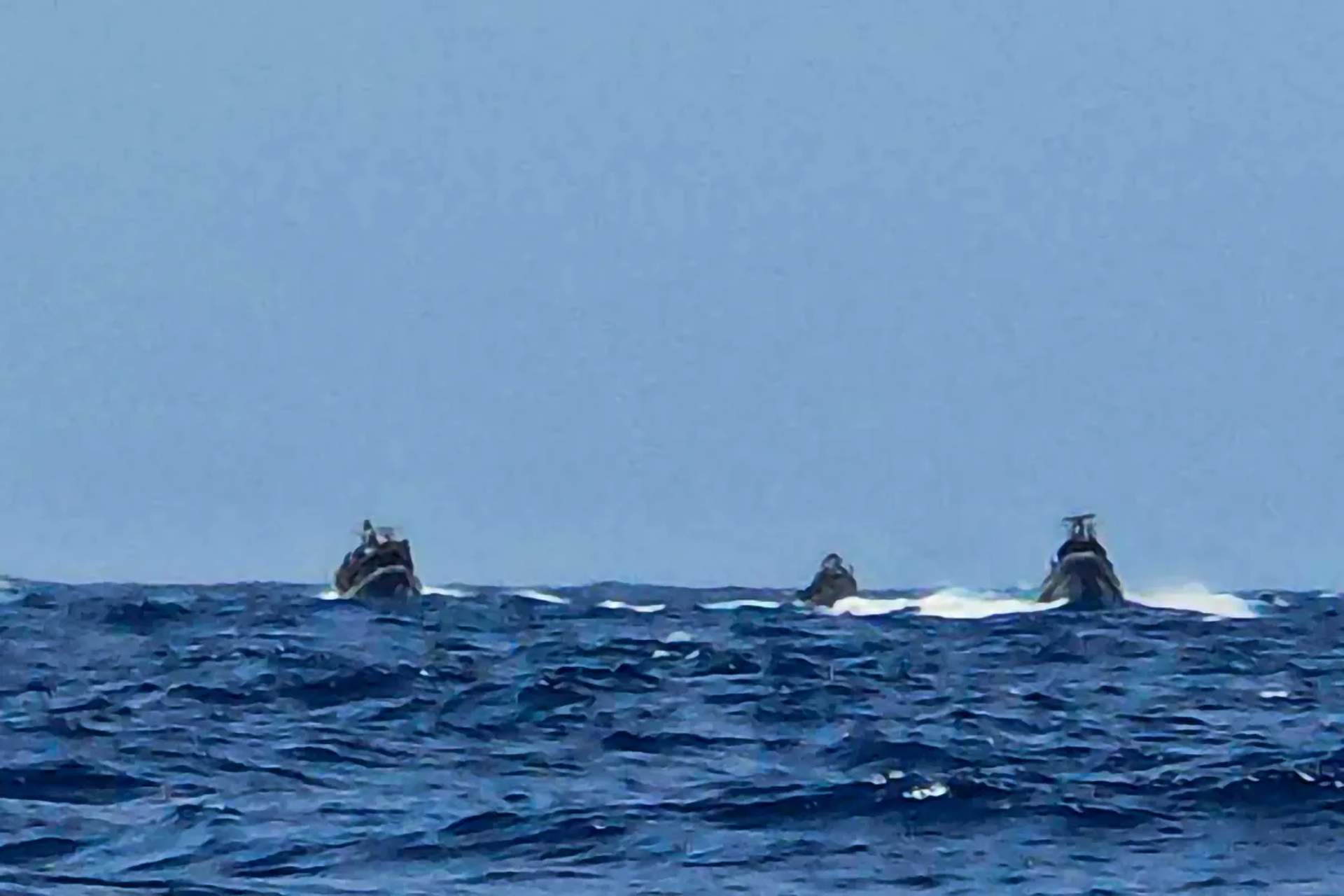 Israeli warships surrounding civilian boats of the Global Sumud Flotilla in international waters