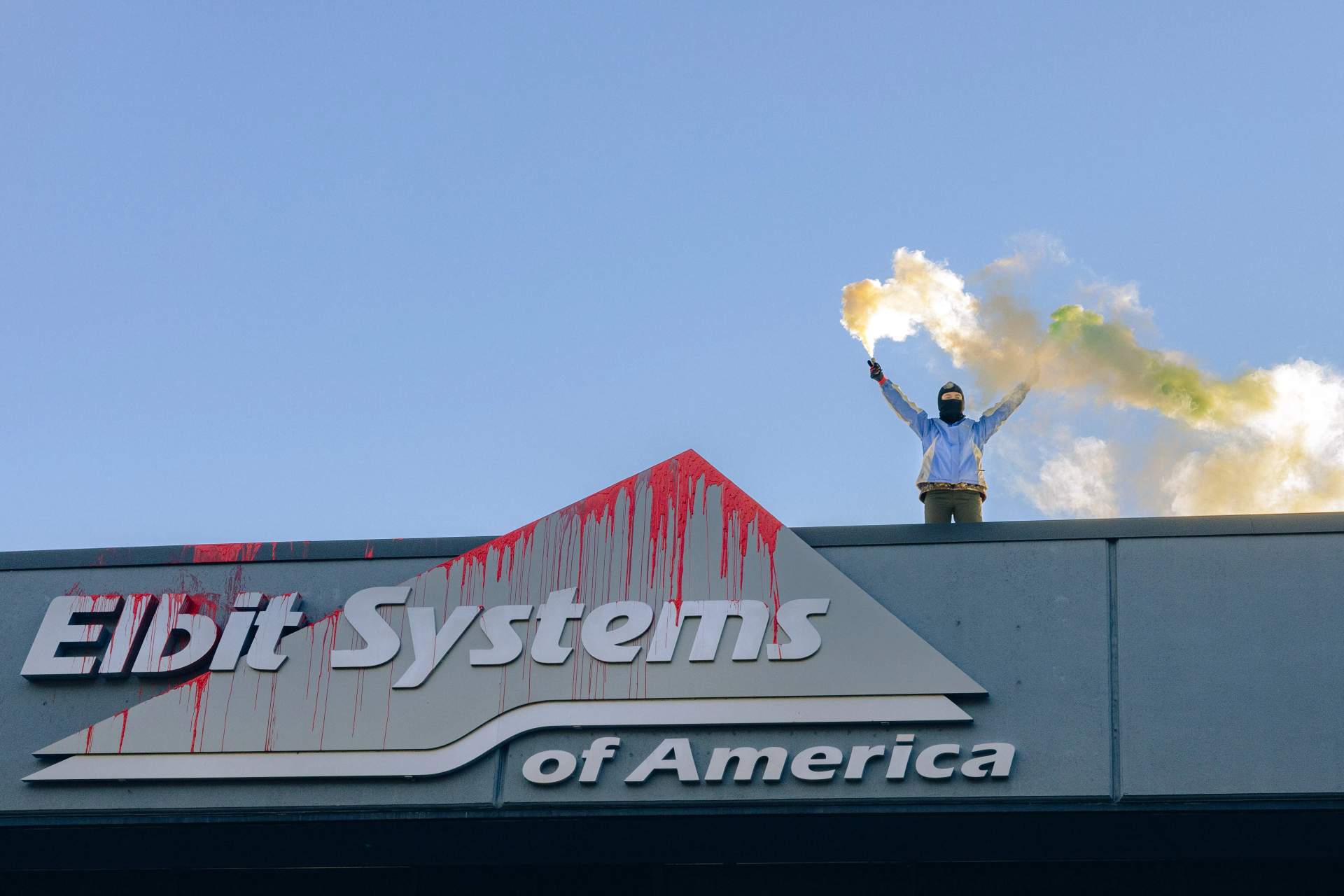 Activists target the Elbit Systems offices in Merrimack, N.H., blocking entrances and painting the facility red, on Nov. 20, 2023.