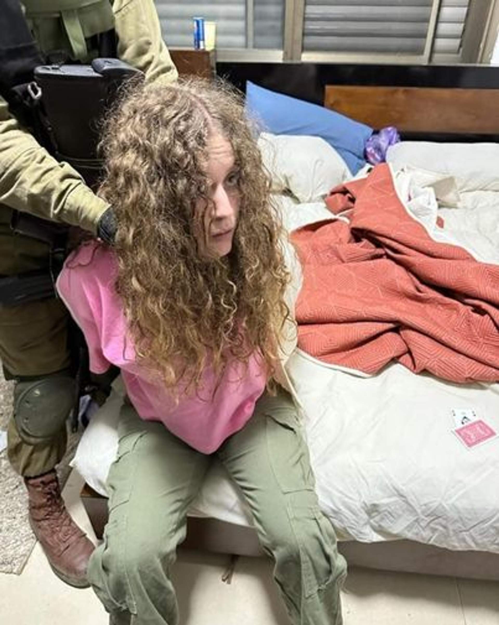 Ahed Tamimi dragged from her bed durring a raid Nov 7th 2023