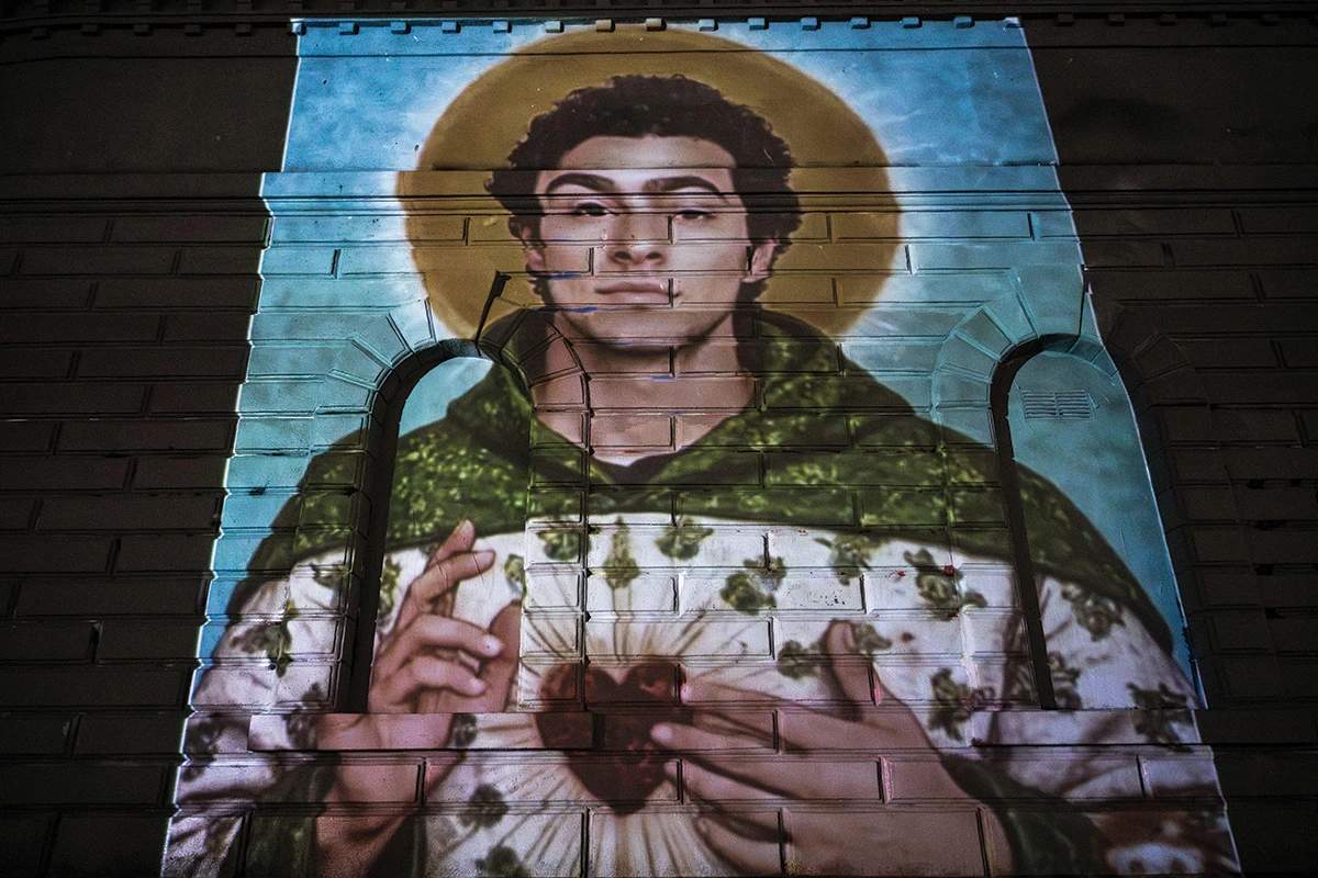 Graffiti featuring Luigi Mangione patron Saint of Resistance.