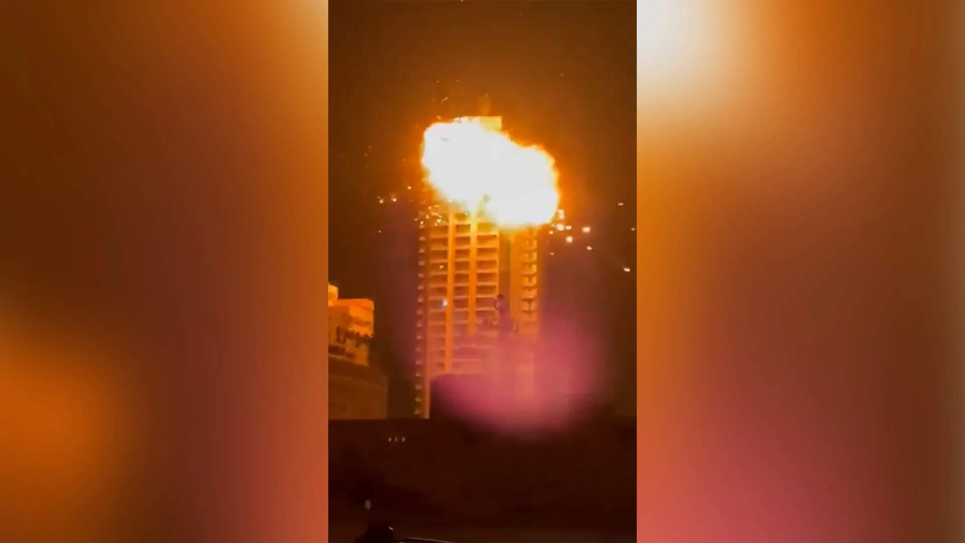 Flames and smoke engulf the Breaker residential tower in Manama, Bahrain after an Iranian drone strike on February 28, 2026.