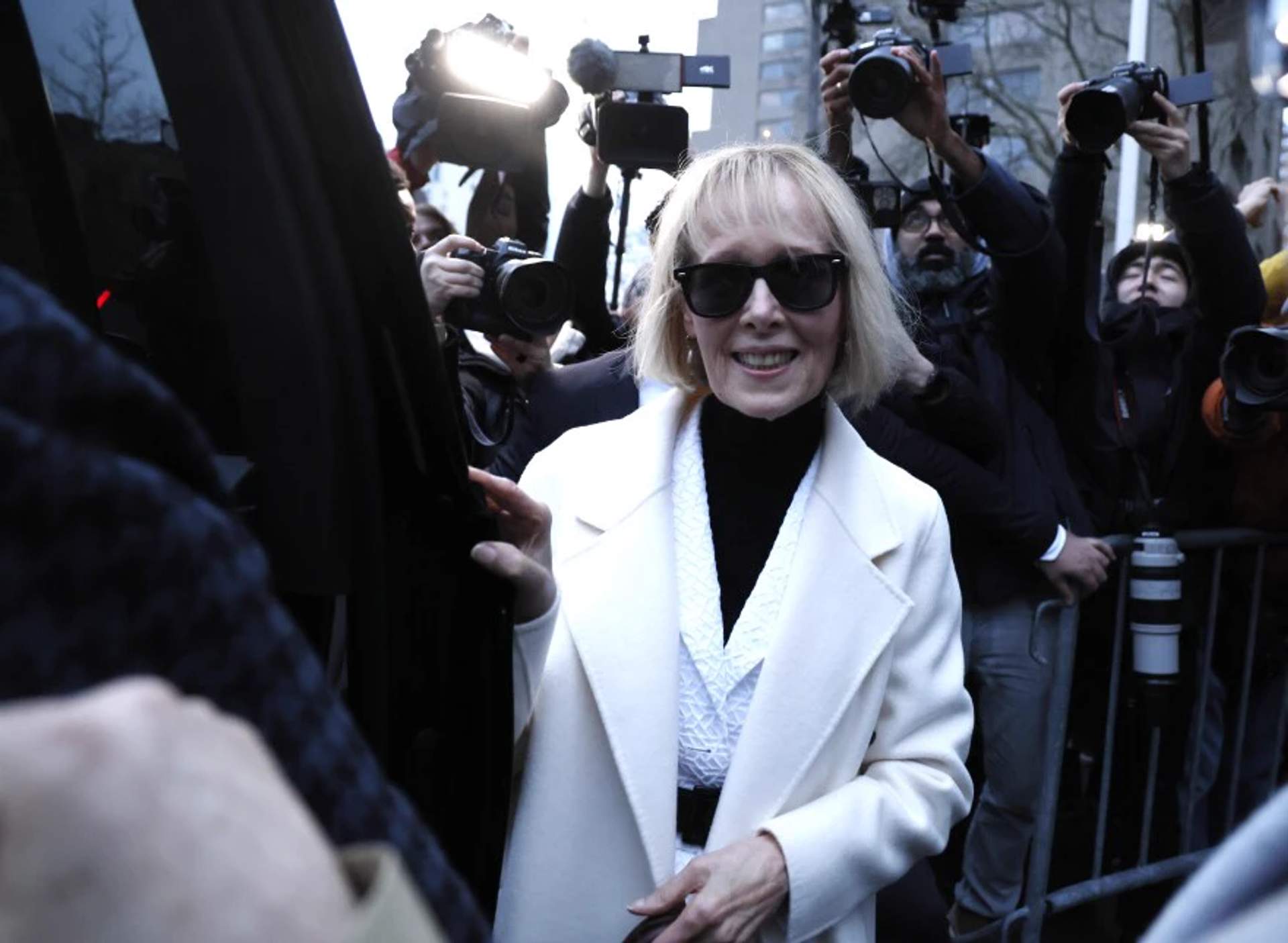 E. Jean Carroll walking outside Manhattan federal courthouse following her defamation trial victory