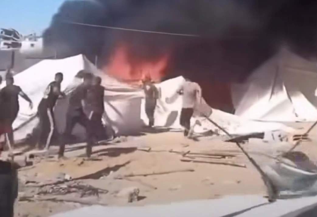 Tents burning after drone strike by IOF.