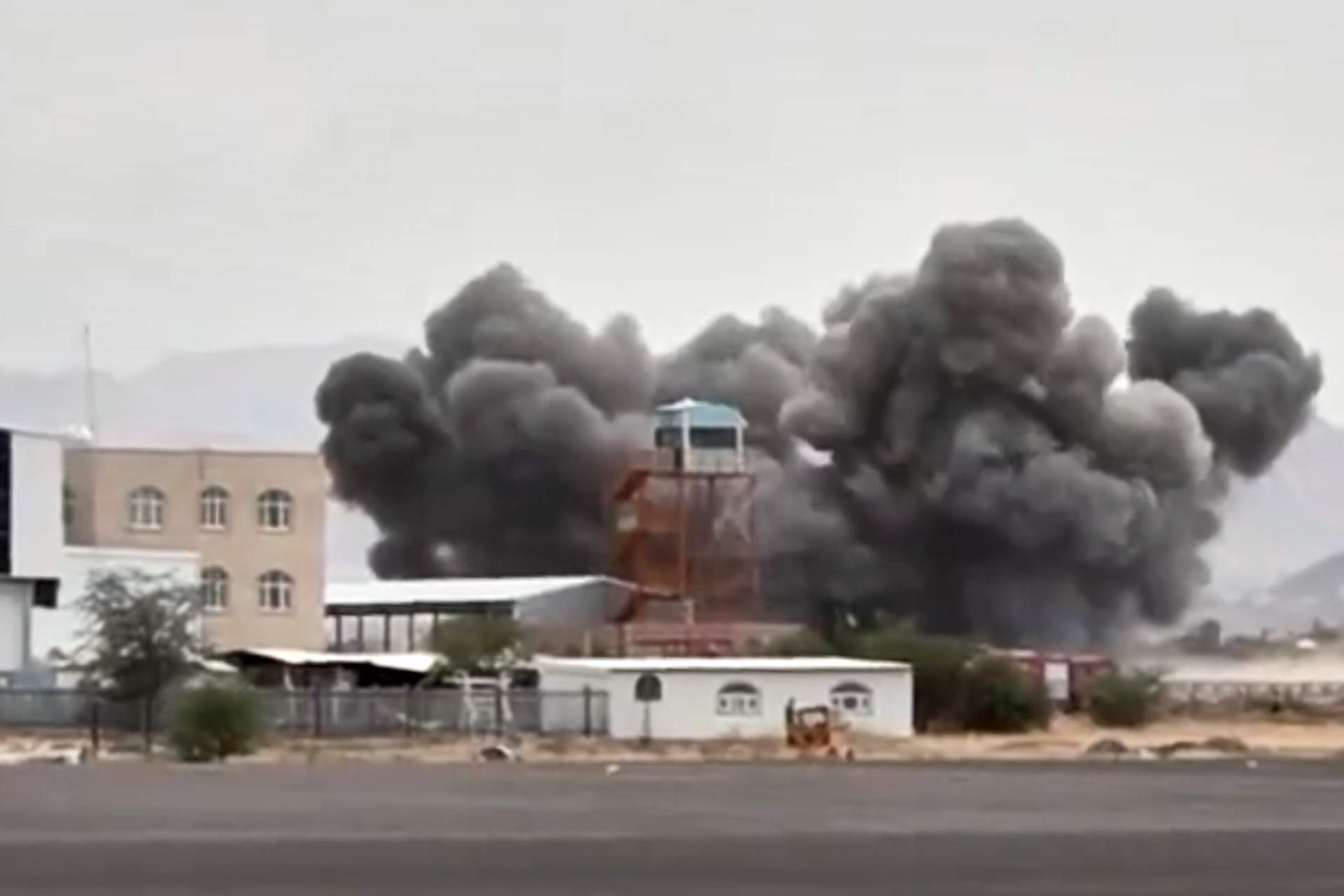 Image taken from video broadcast by Al-Masirah TV, a Houthi-controlled news channel, shows an explosion at the Sanaa International Airport