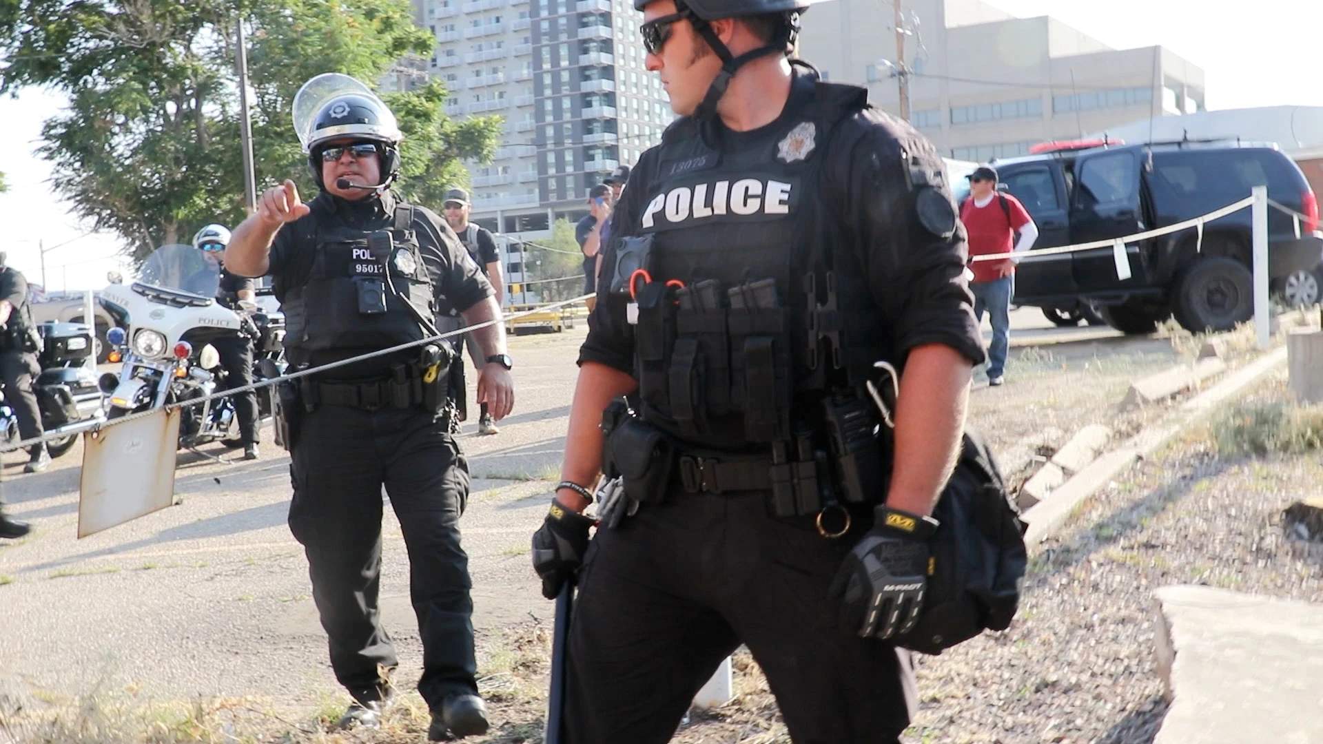 The aftermath: police clear antifascist protesters from the streets while the fascists who detonated a concussion grenade walk free under armed escort. This is not policing. This is a gang.