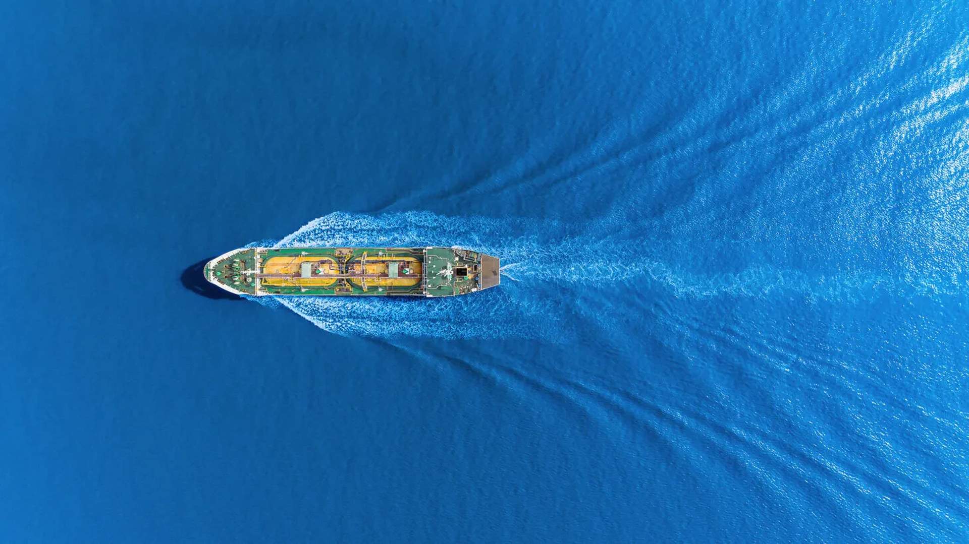 Aerial view of an oil tanker transporting oil from a refinery on the sea