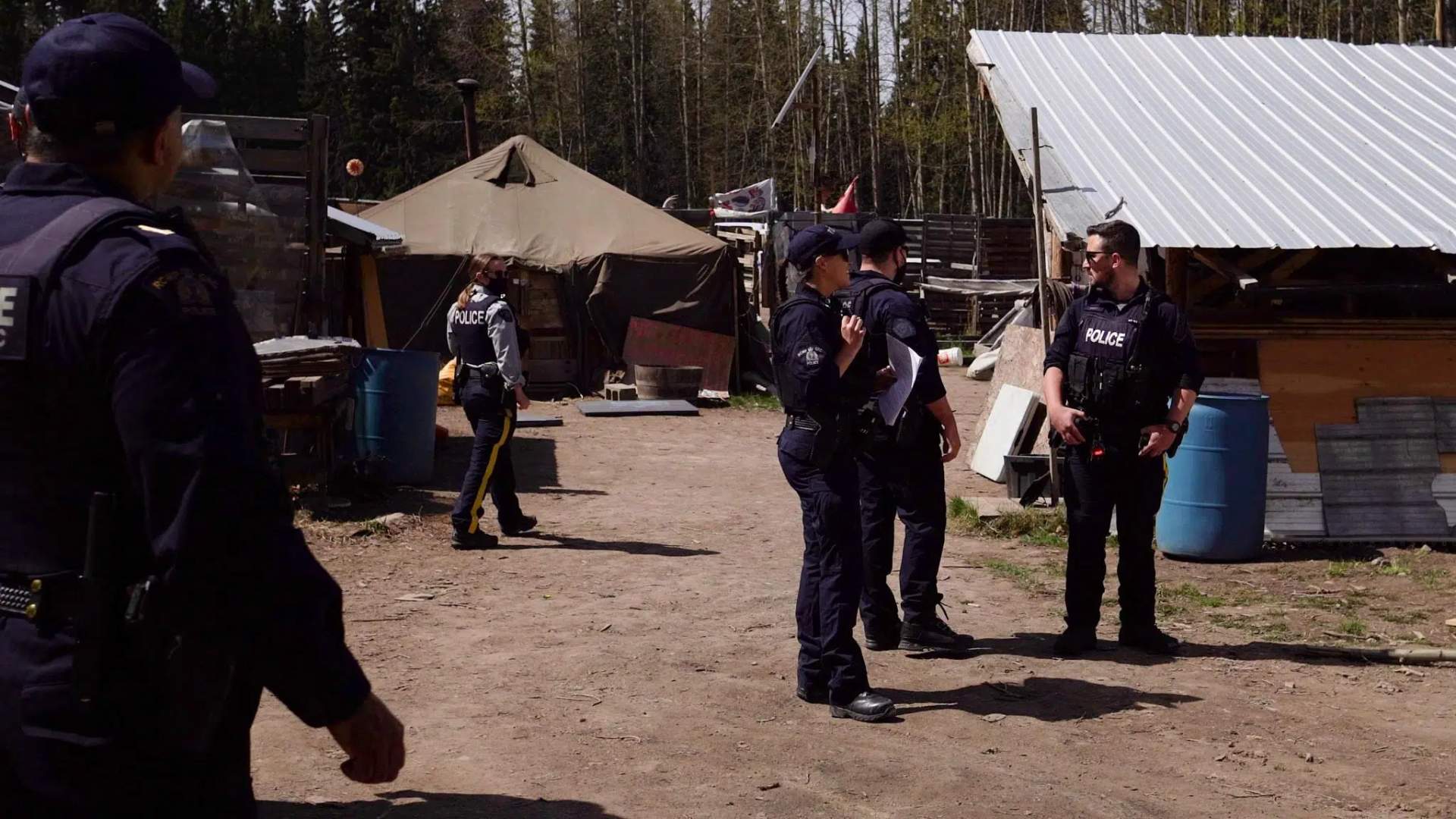 RCMP Conducts Site Inspection of Wetsuweten Village - [Credit Gidimt'en Checkpoint]