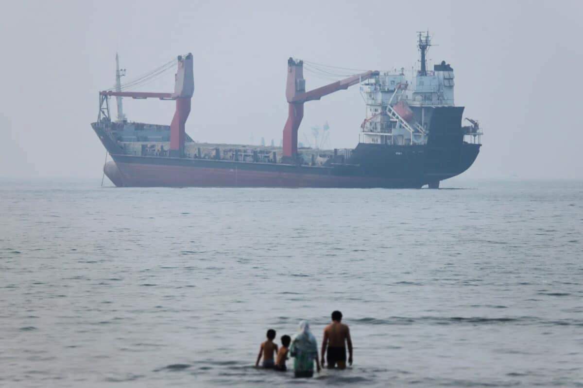 Fire and smoke billowing from an oil tanker hit in the Strait of Hormuz, July 2026