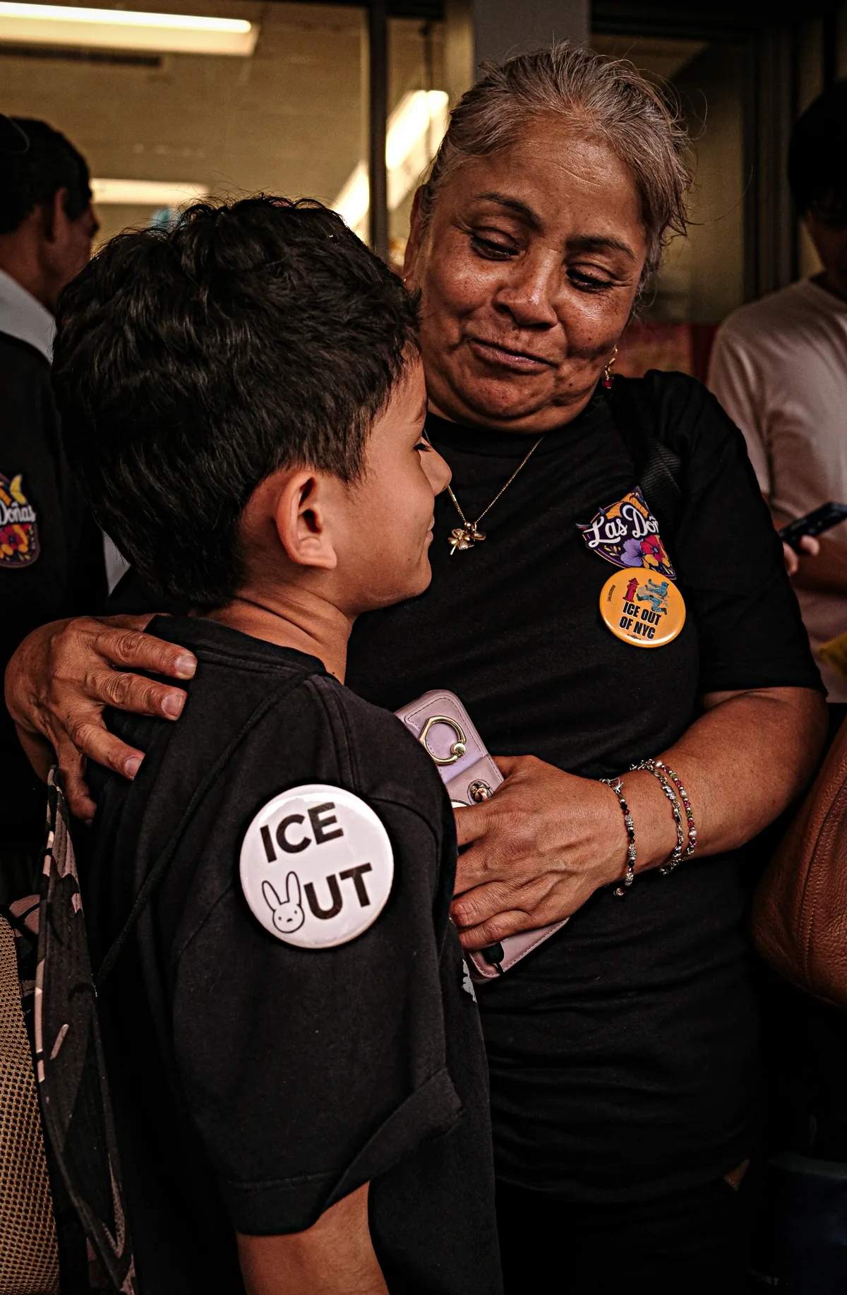 Family joins hundreds of protesters rally at Corona Plaza in Queens against ICE enforcement operations