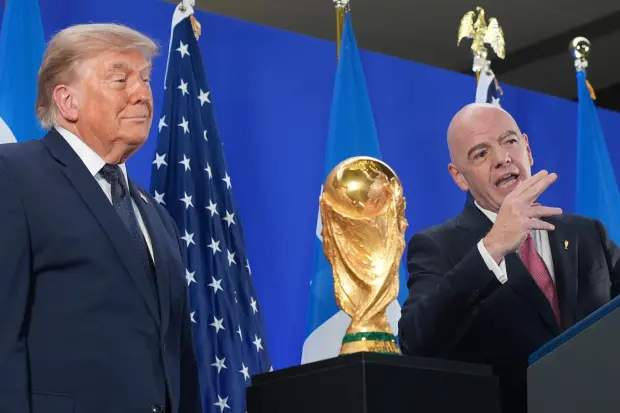 President Donald Trump listens as FIFA President Gianni Infantino speaks at a reception at Trump Tower in New York, Friday, July 17, 2026.