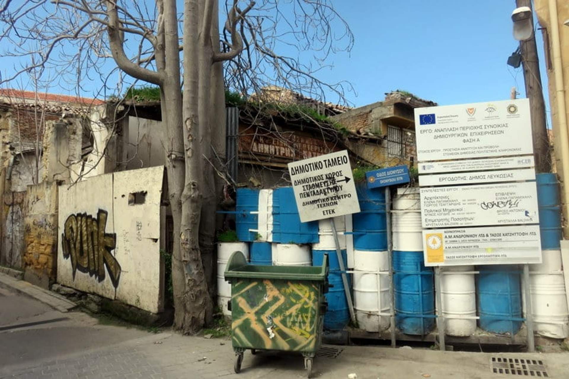 UN Green Line buffer zone with oil barrels in Nicosia