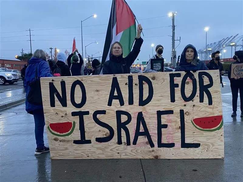 Pro-Palestinian demonstrators swarm the Port of Tacoma on Nov. 6, 2023, to protest a Middle East-bound