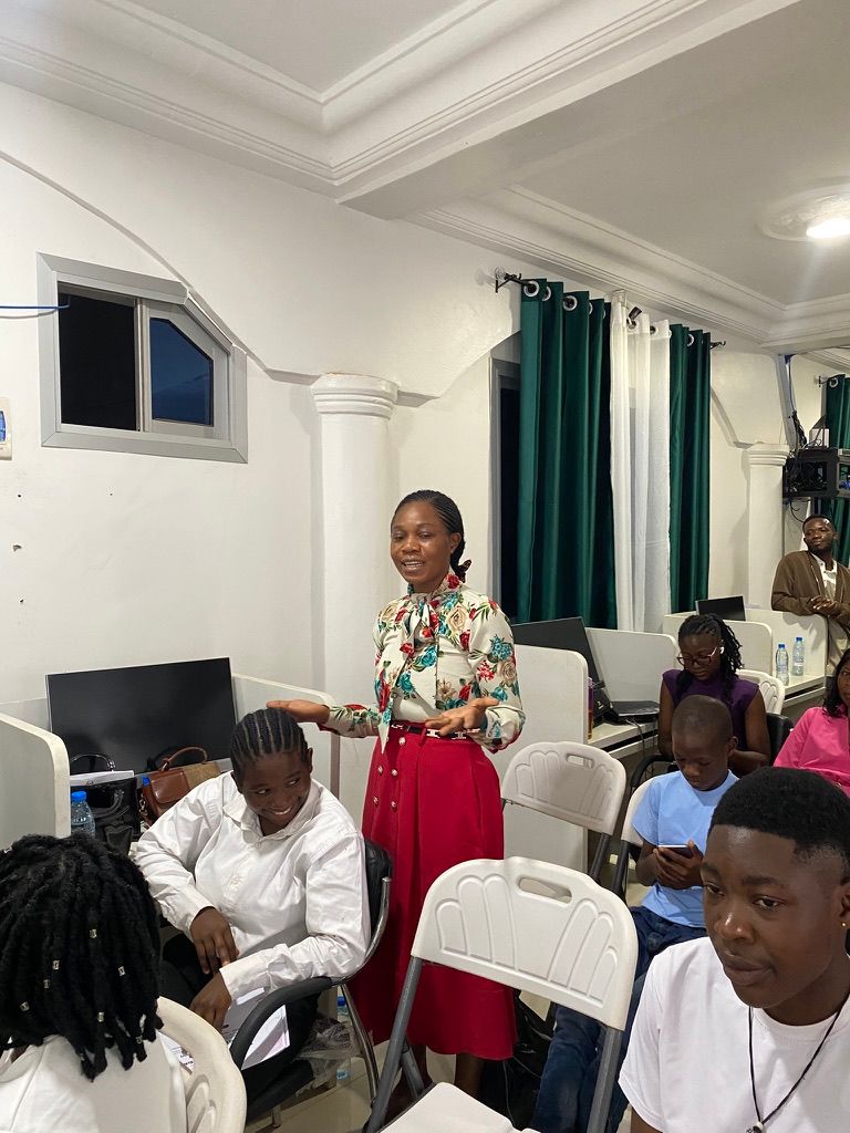 A Togeva mentor working with students during a Summer School session