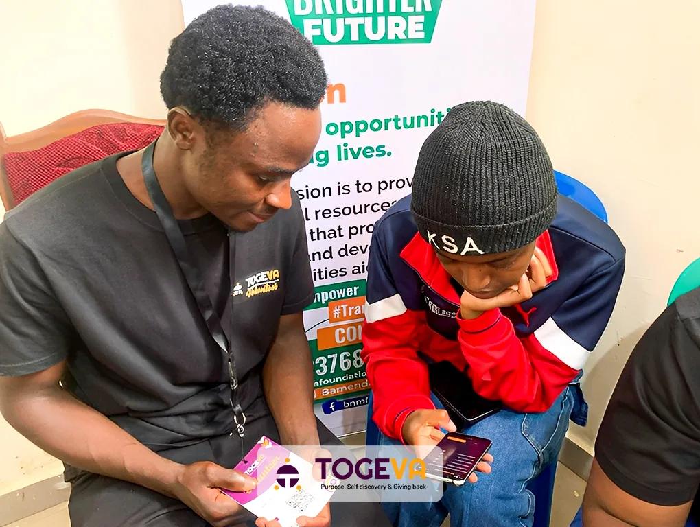 A Togeva volunteer guiding a student one-on-one
