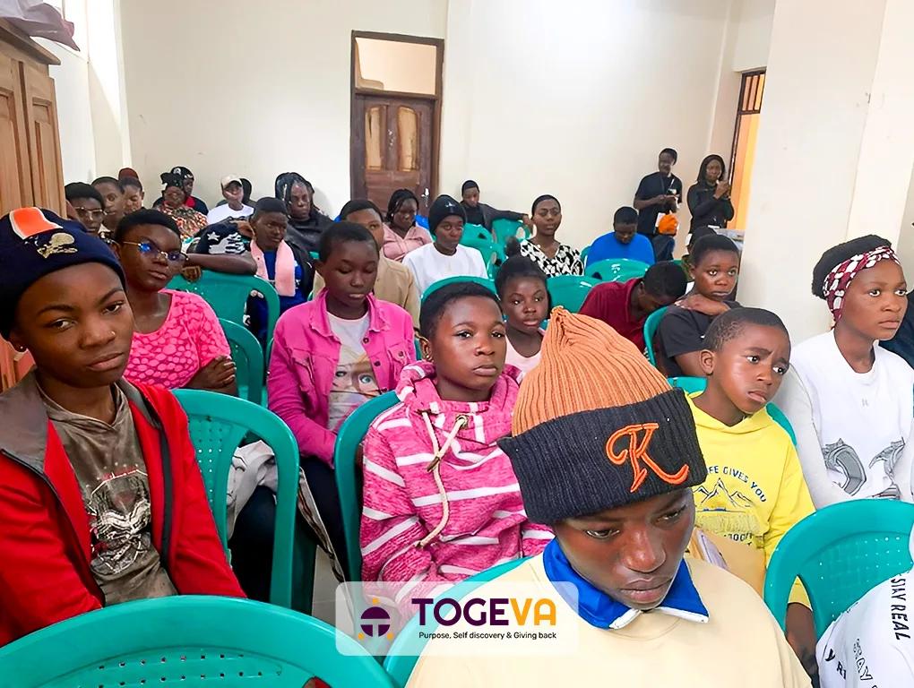 Students seated and listening during the orientation session