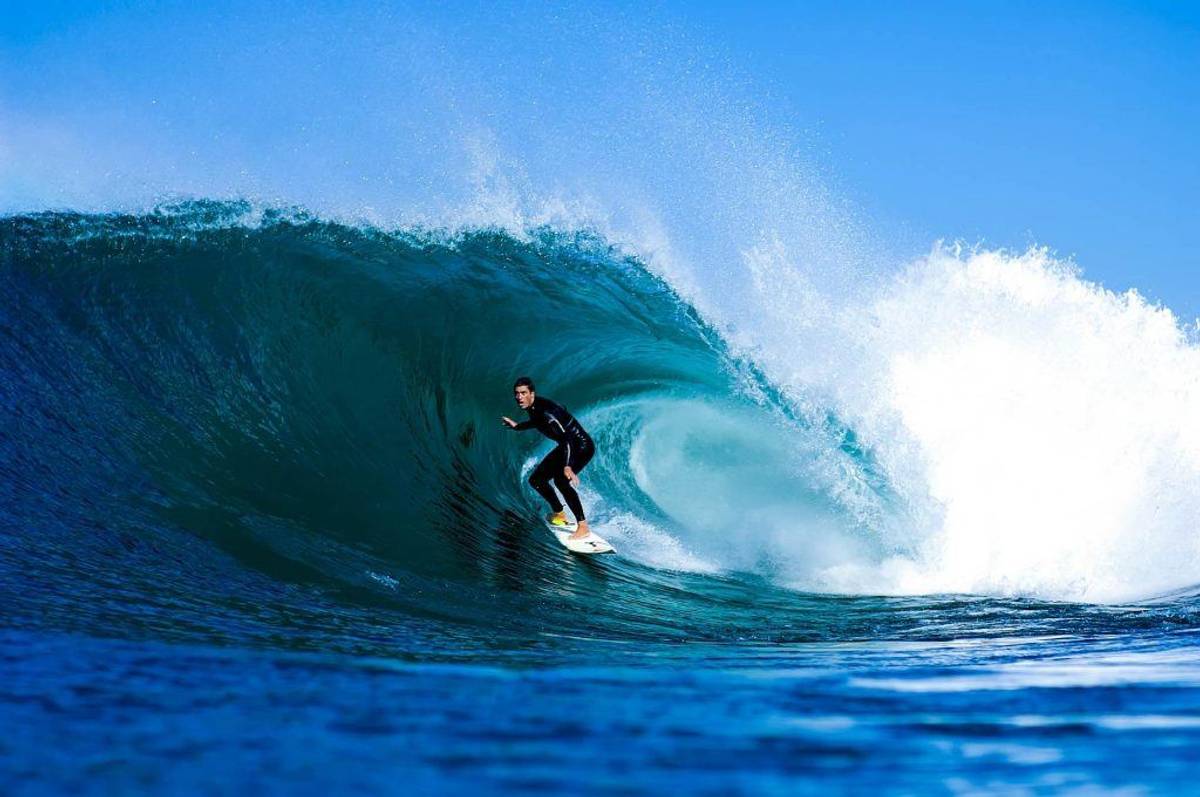 A man surfing in Ericeira