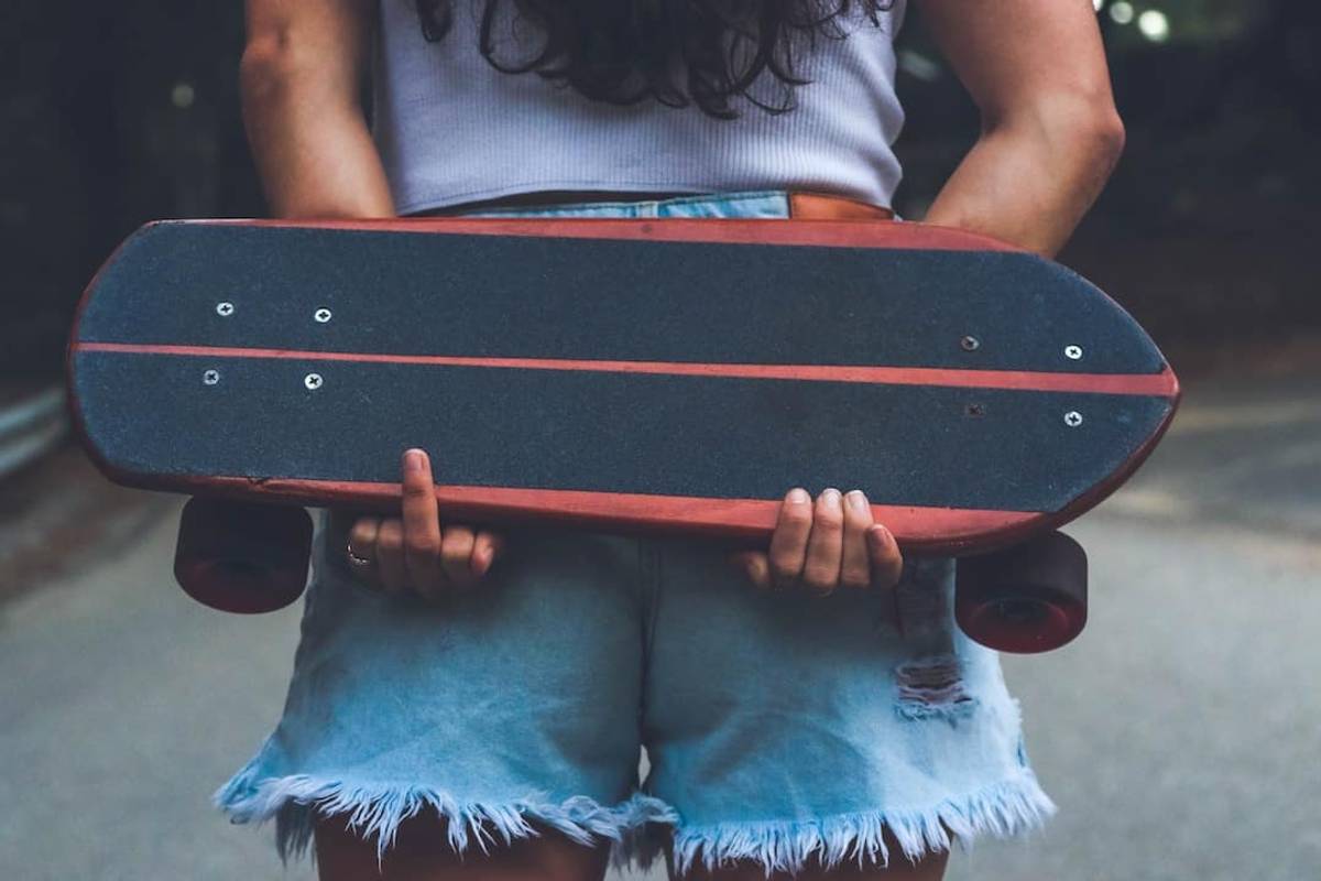 Surfer girl that does the middle finger