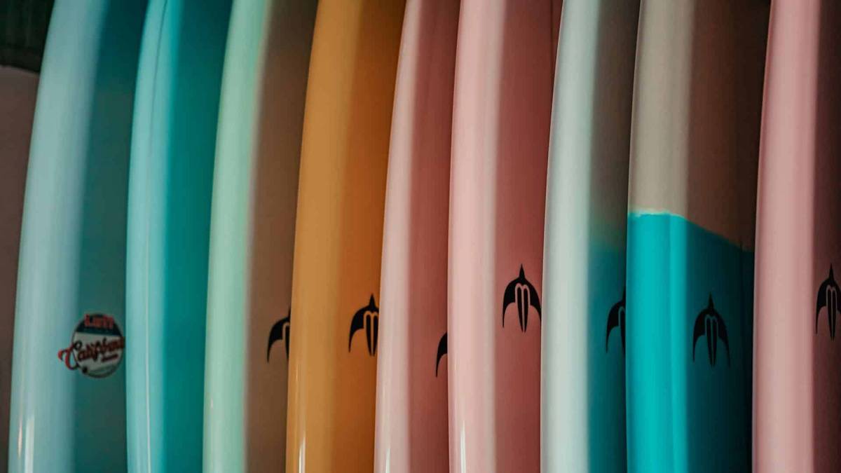 An image of a collection of surfboards