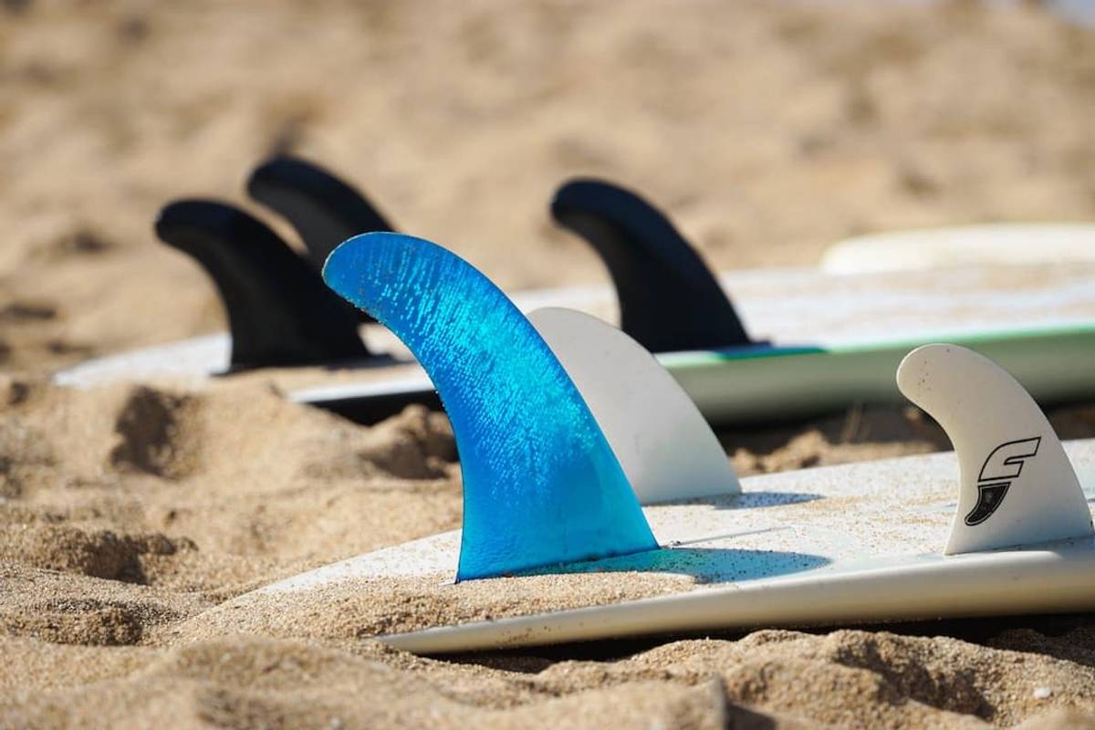 3 Thruster surfboard on the shore