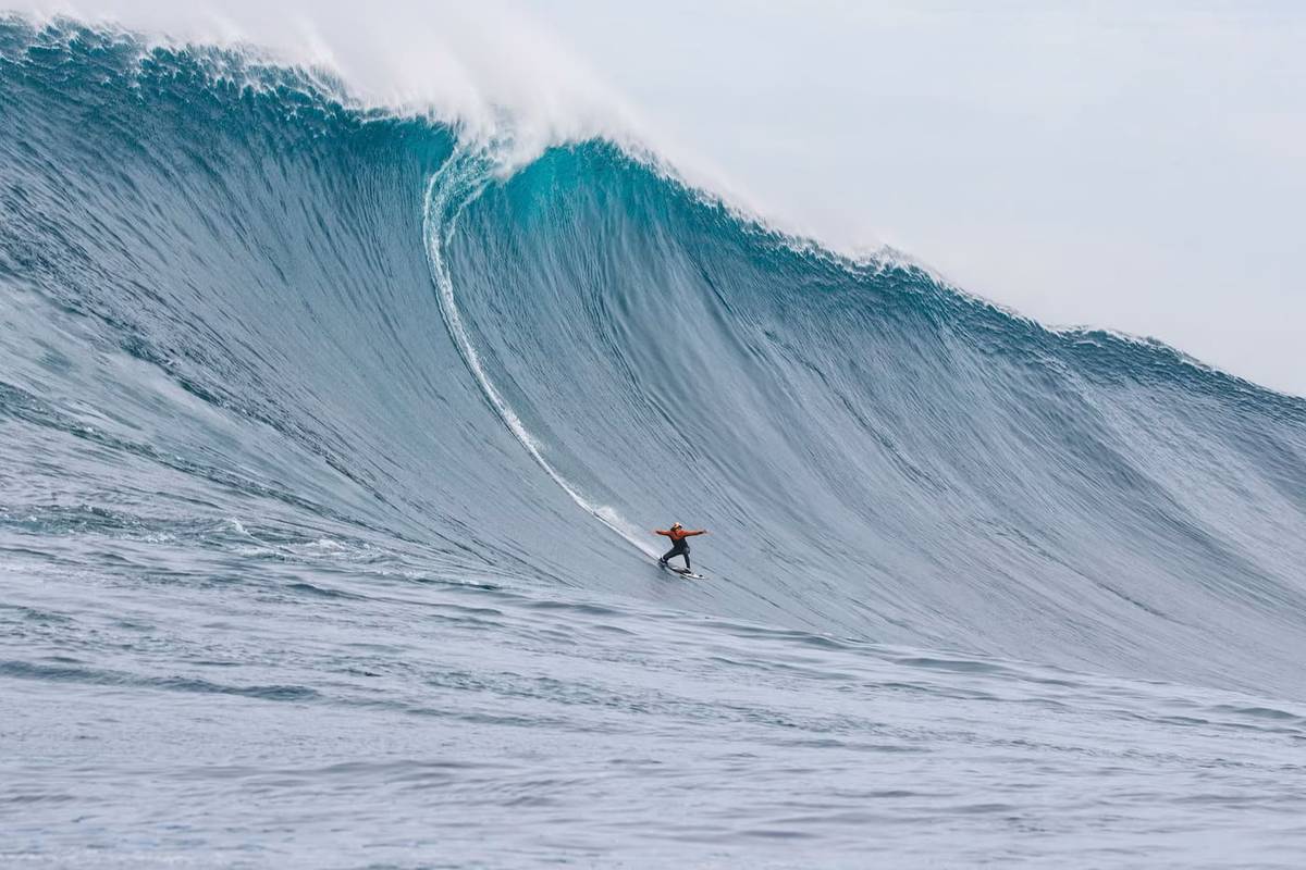 An image of a person surfing Cortes Bank Wave in Southern California, home of beaches with the biggest waves
