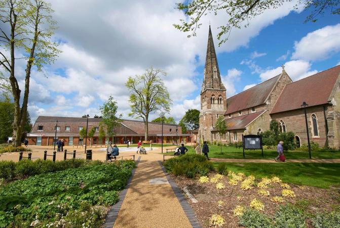All Saints Church and Kings Heath Village Square on a sunny day