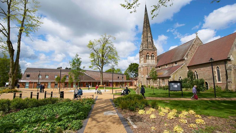 All Saints Church and Kings Heath Village Square on a sunny day