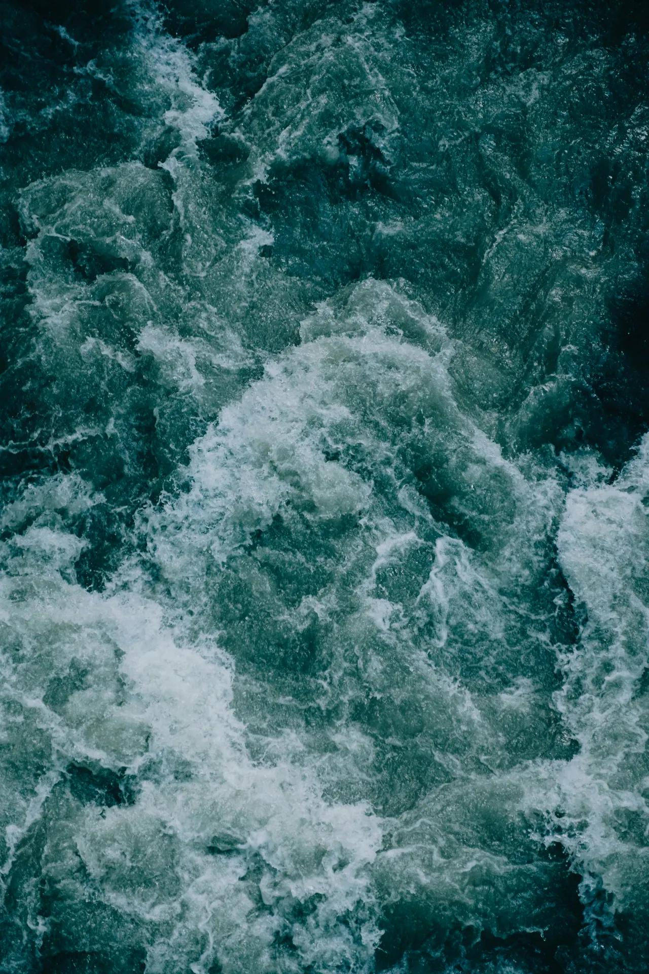 Rippling water visualizes interacting frequencies in sound.