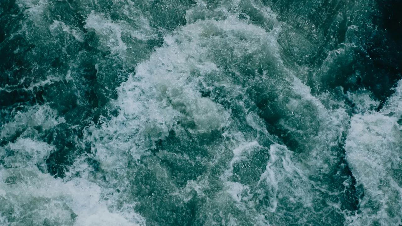 Rippling water visualizes interacting frequencies in sound.