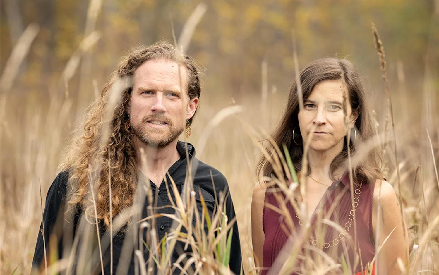 ThirdTone co-founders Evan Premo and Lisa Masé in a field.