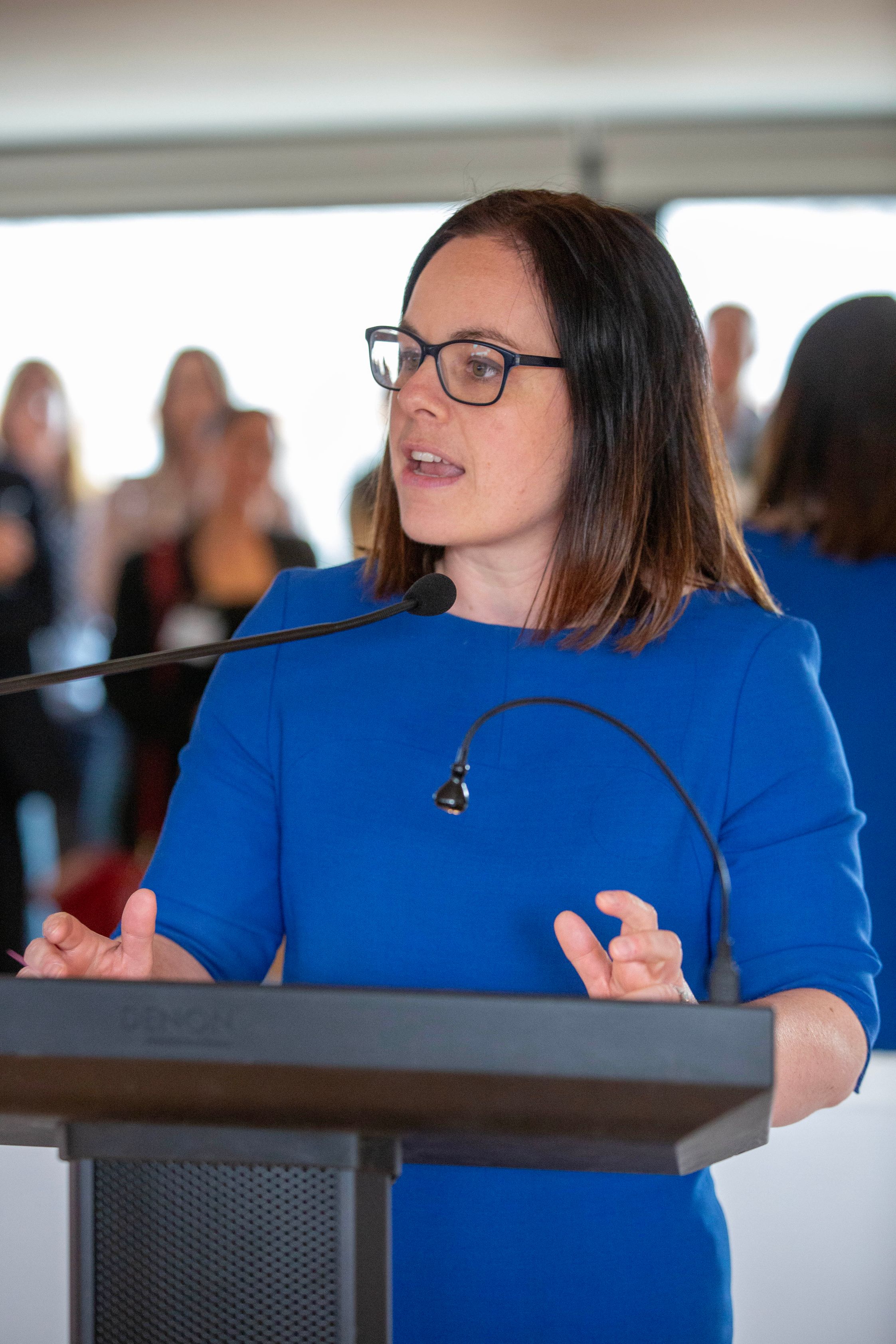 Deputy First Minister Kate Forbes speaking at the launch event in a blue dress