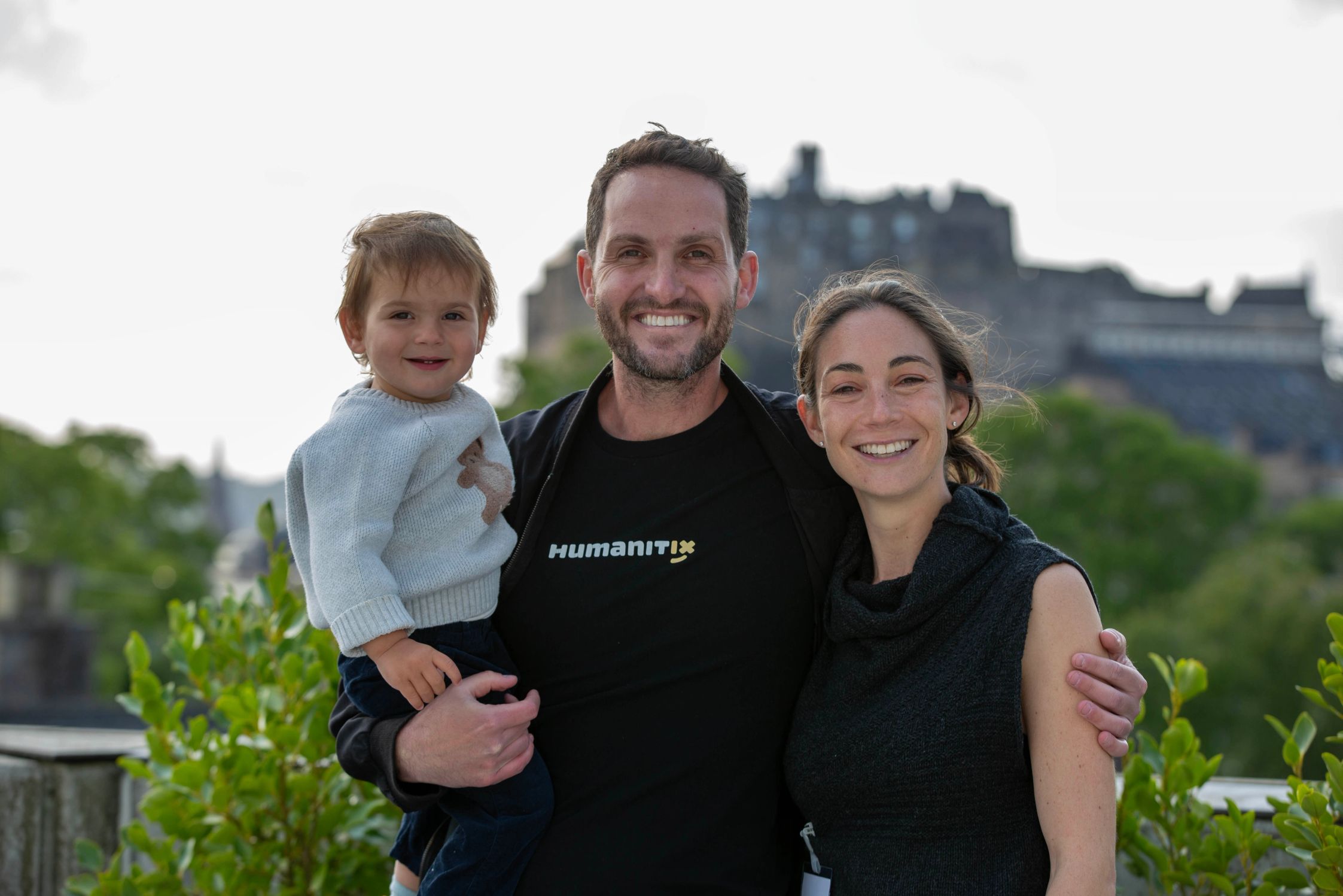 Adam and his son Henri and wife Natalie in front of the Edinburgh Castle at the launch event