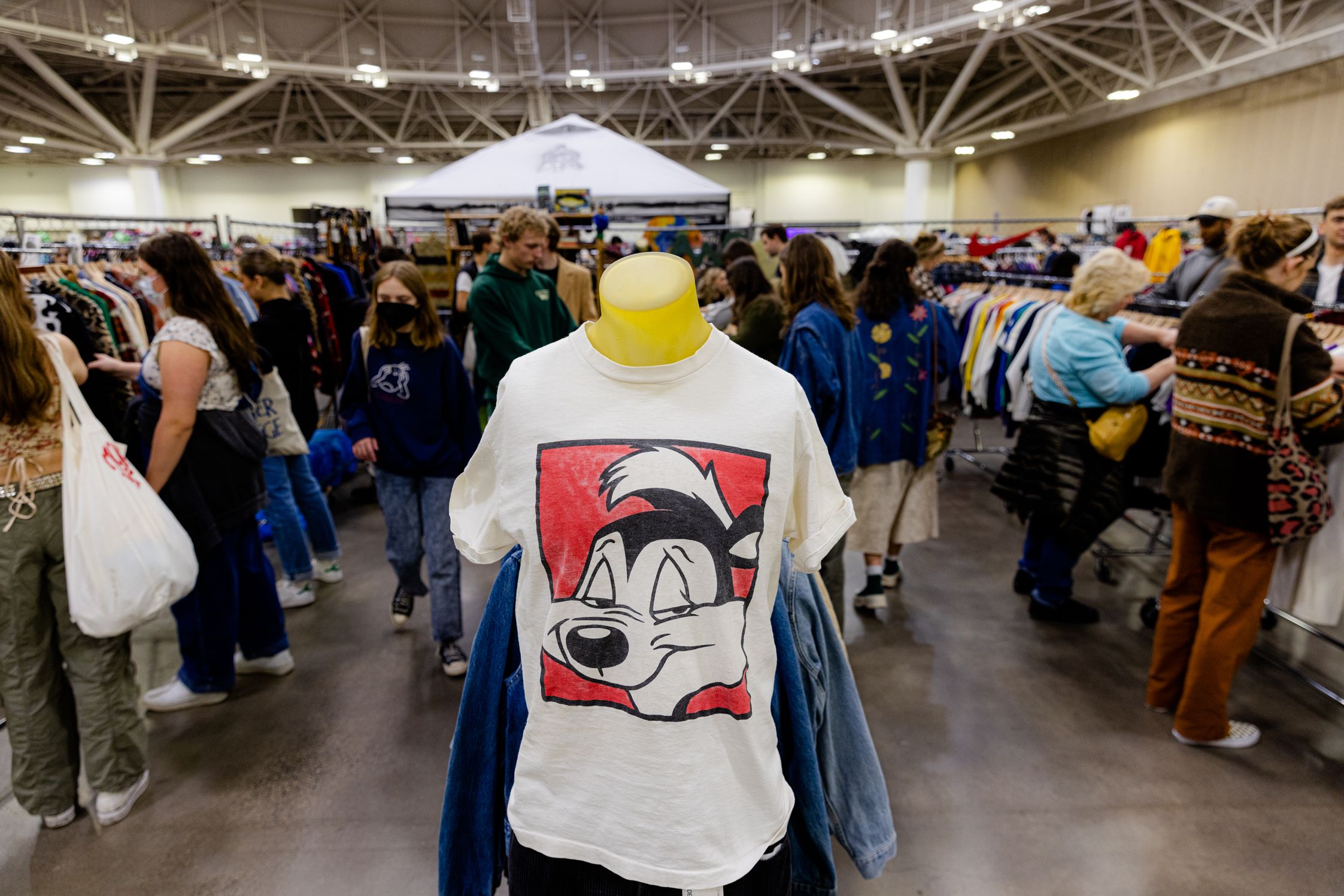 Vintage t-shirt in focus with the market in the background