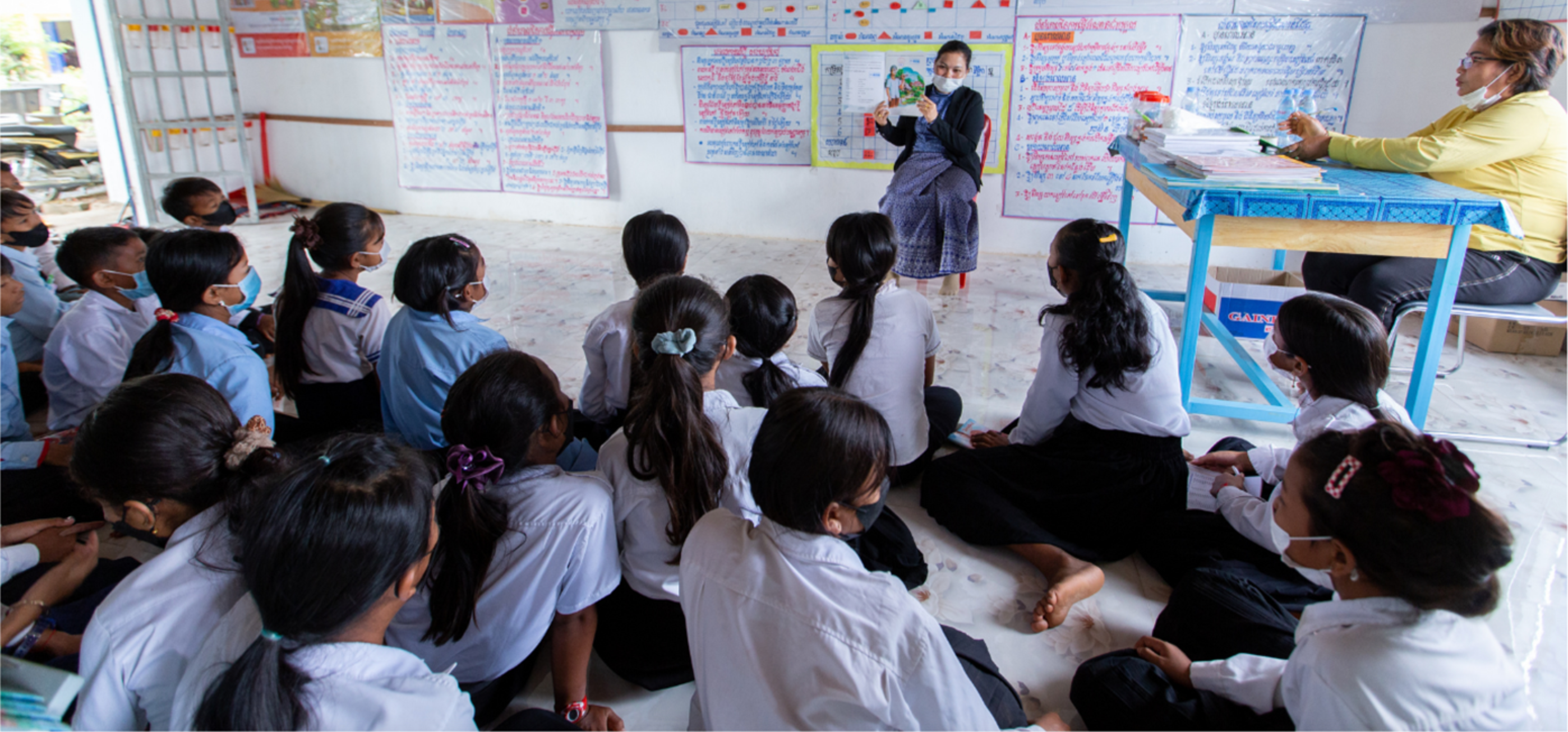 Children engaged in a read aloud in Room to Read’s Literacy Program in Cambodia