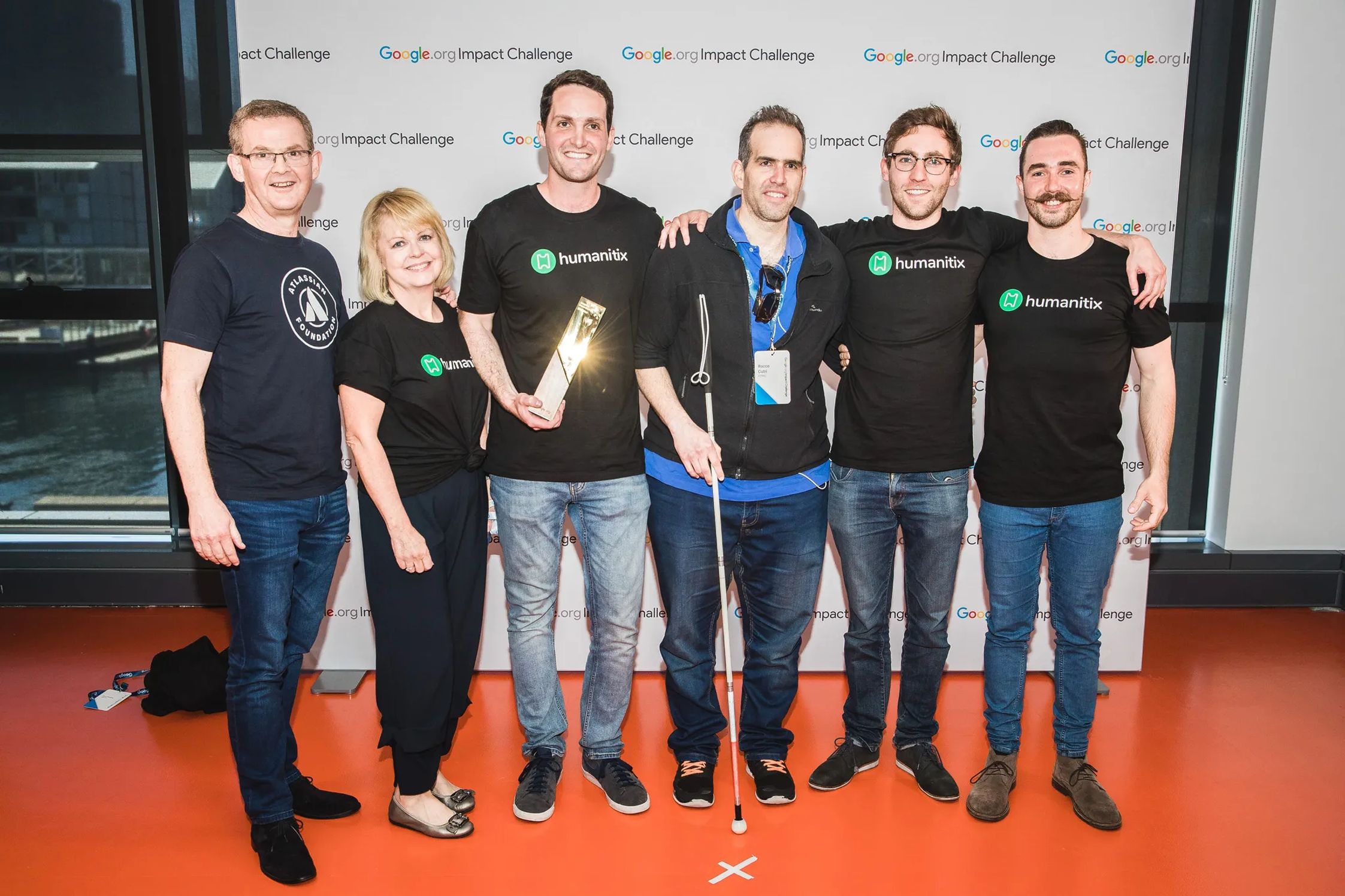 The Humanitix team with Rocco, a person with blindness, at the Google Impact Challenge