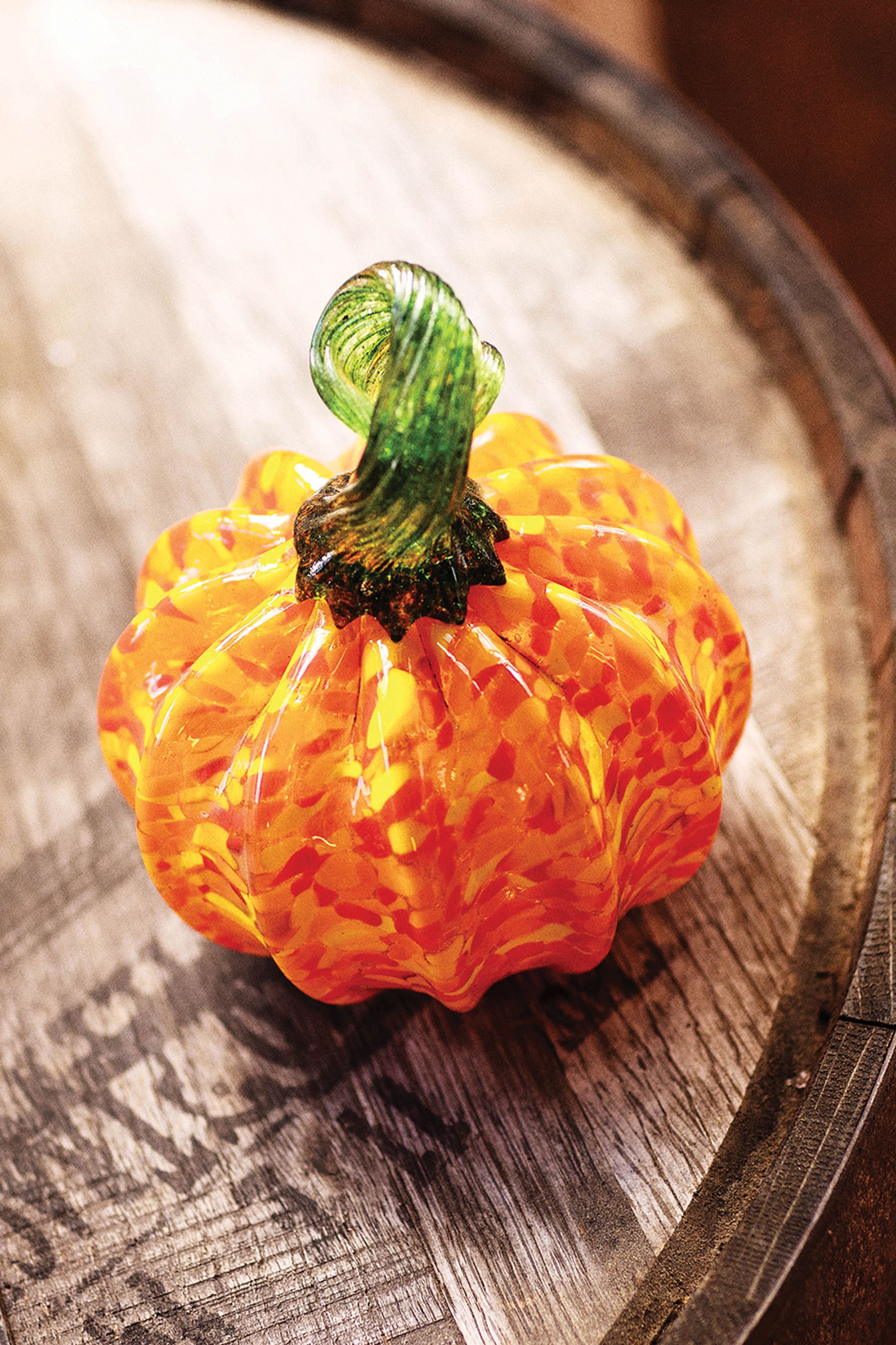 A beautiful orange and green glassblown pumpkin